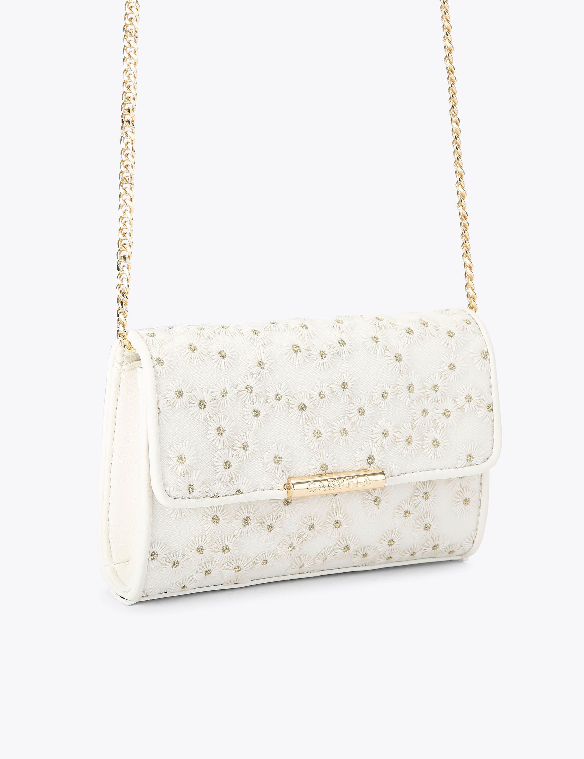 Carvela embroidered daisy chain strap clutch bag, imported from the UK