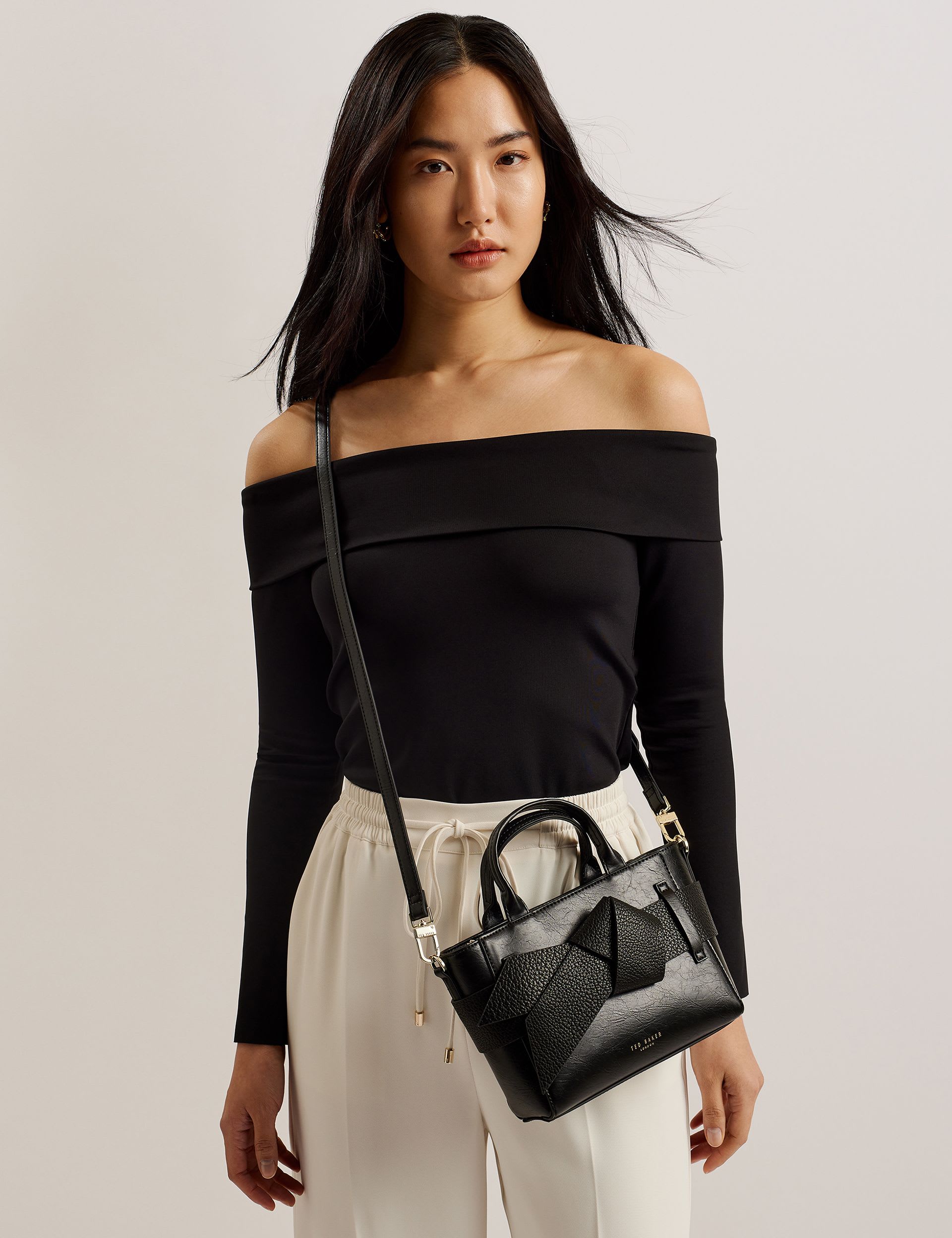 Ted Baker mini cross body bag with bow, imported from the UK