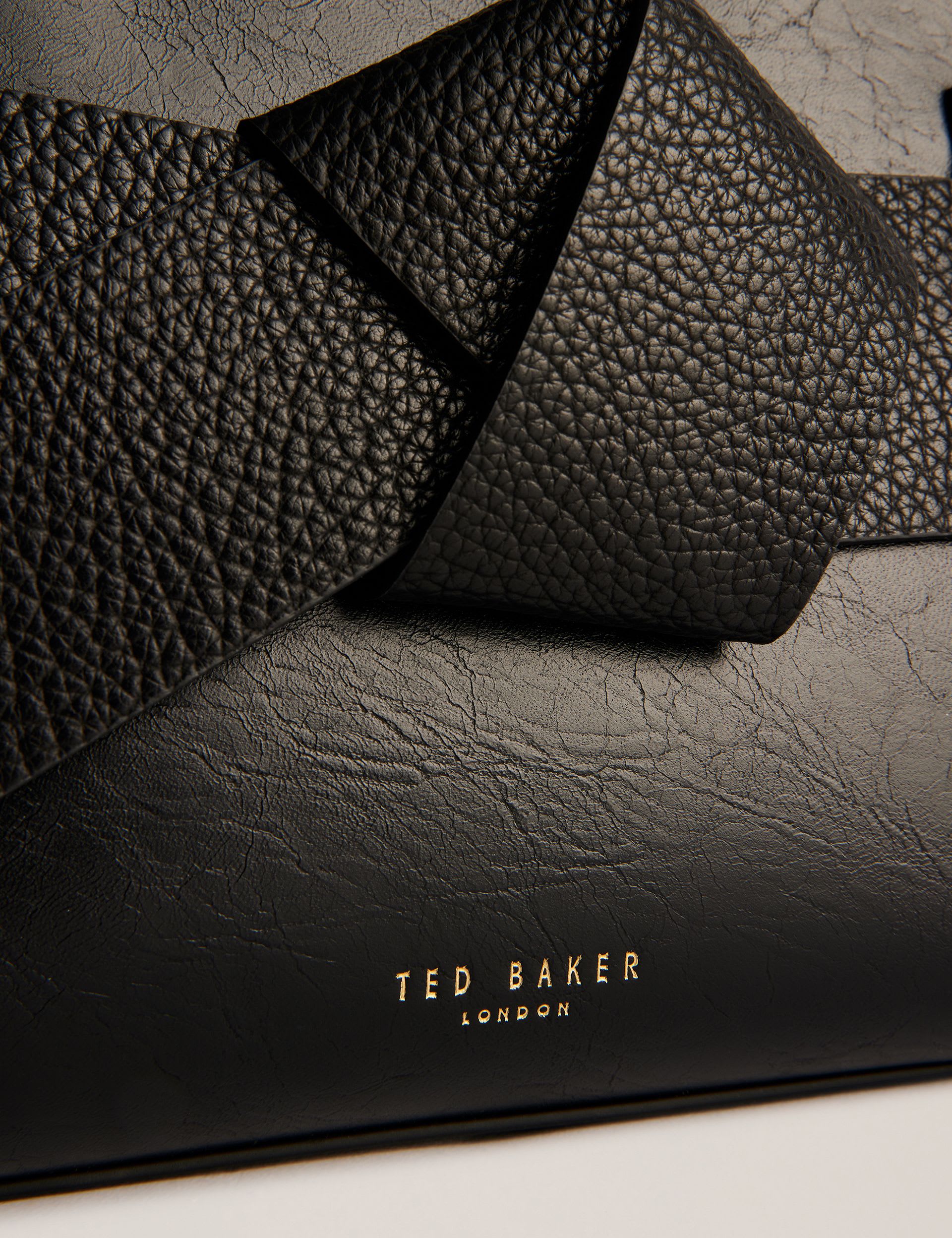 Ted Baker mini cross body bag with bow, imported from the UK
