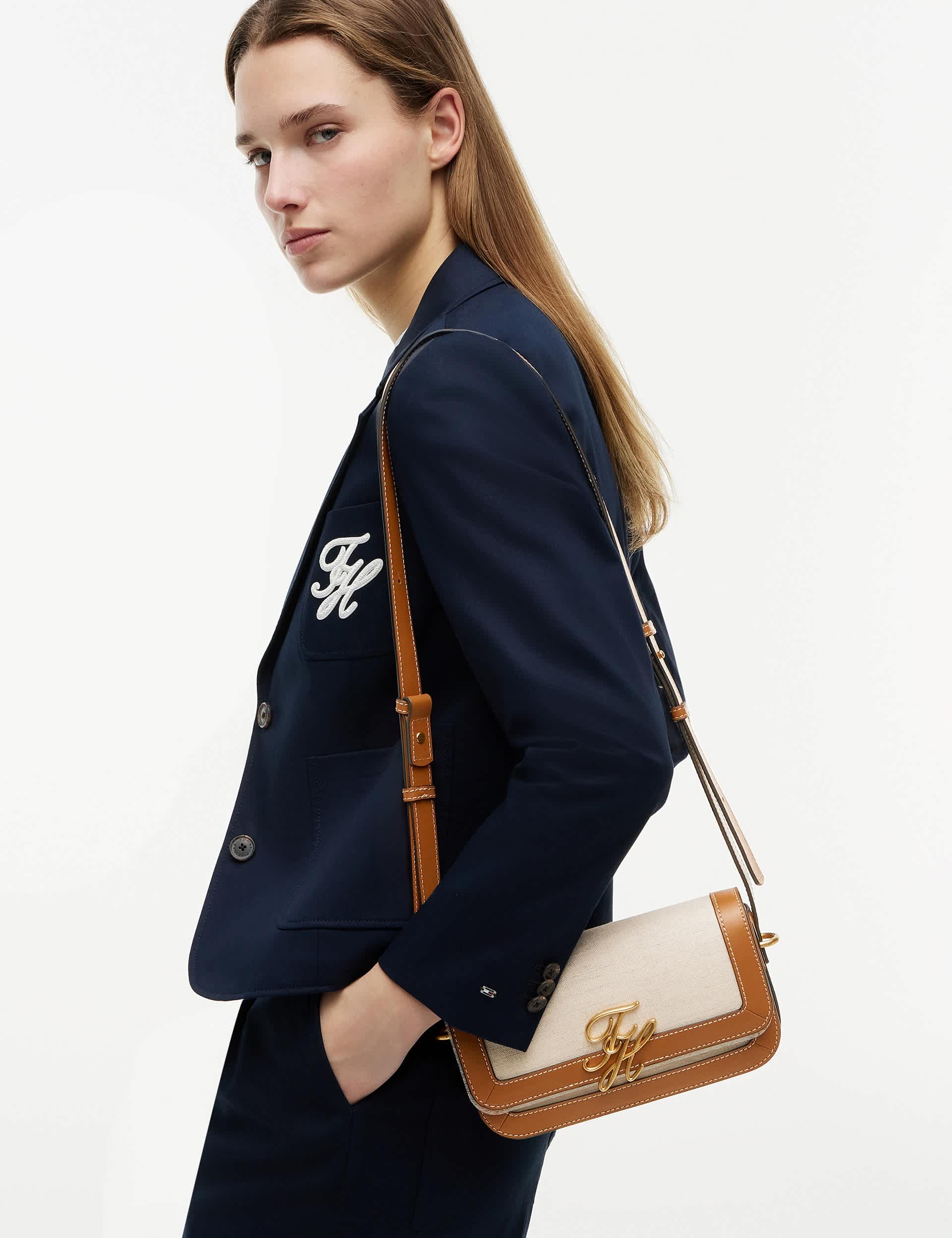 Tommy Hilfiger Script Canvas cross body bag with leather trim, UK version