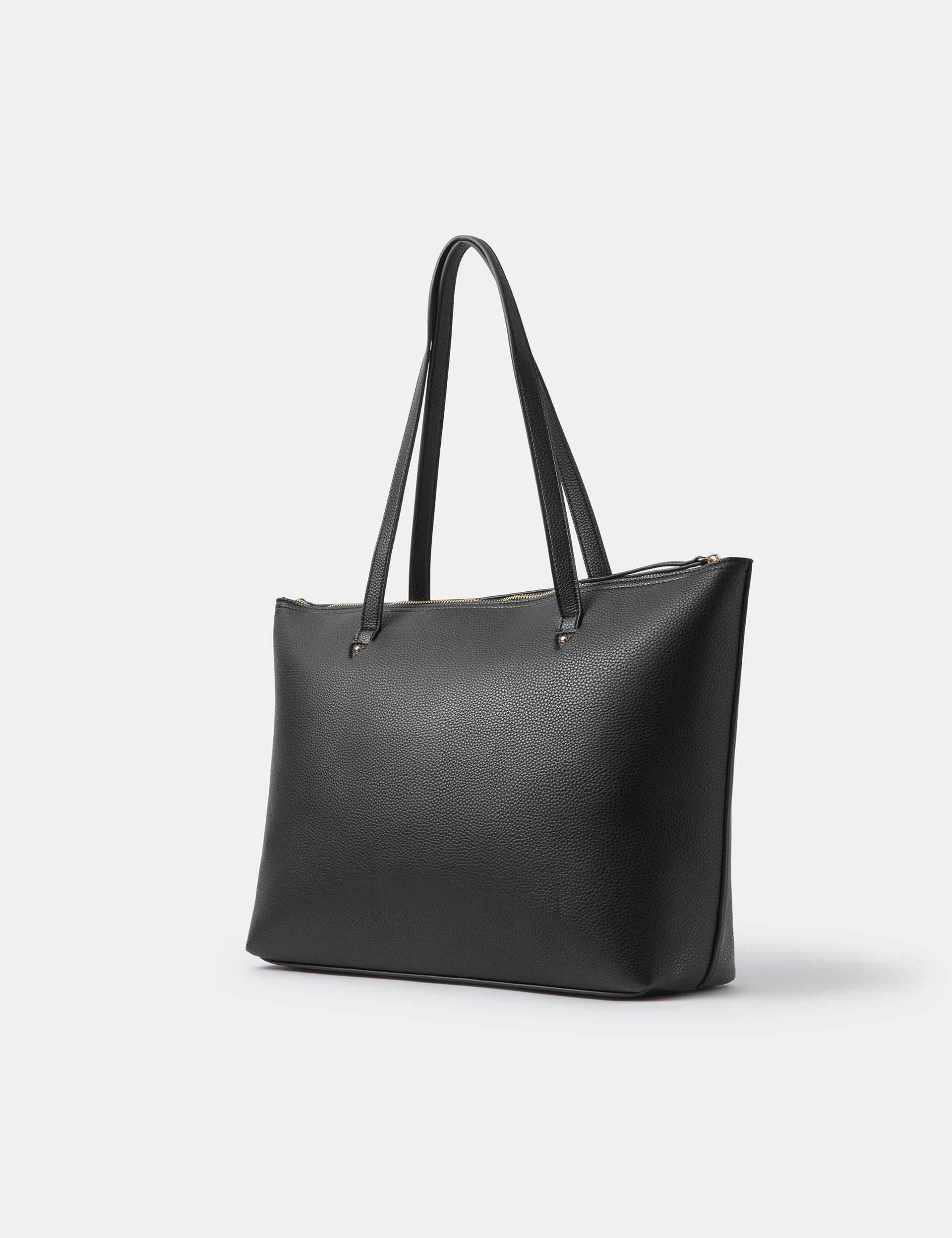 Accessorize faux leather tote bag with gold hardware, imported from the UK