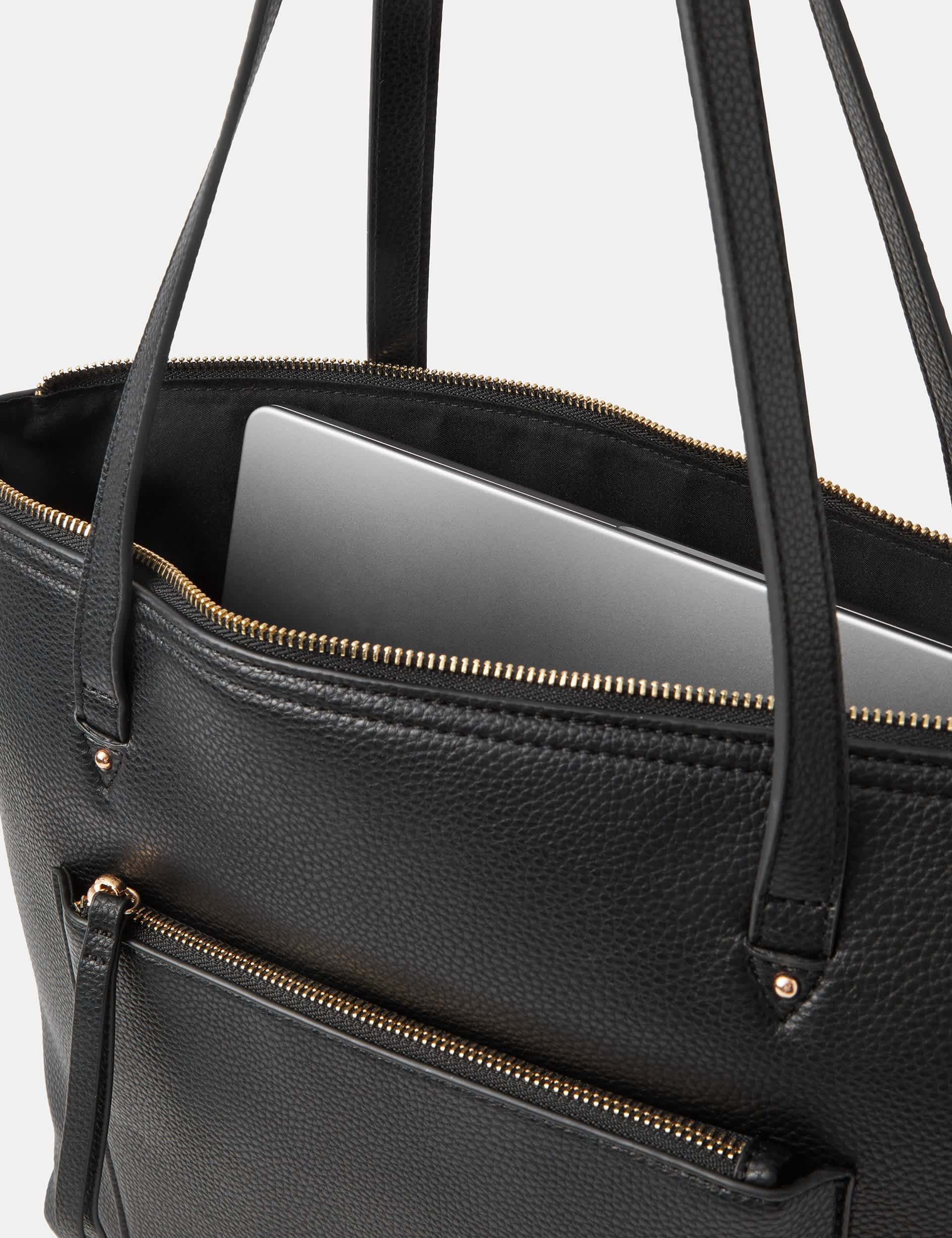 Accessorize faux leather tote bag with gold hardware, imported from the UK