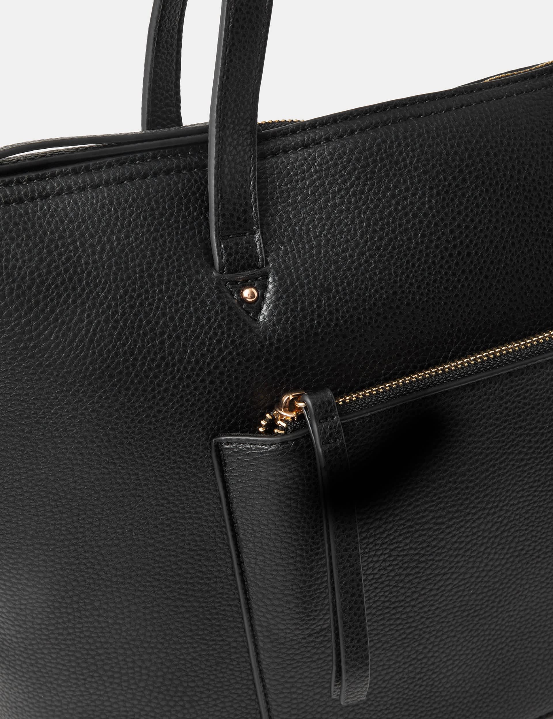 Accessorize faux leather tote bag with gold hardware, imported from the UK