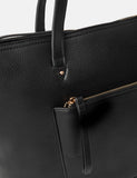 Accessorize faux leather tote bag with gold hardware, imported from the UK