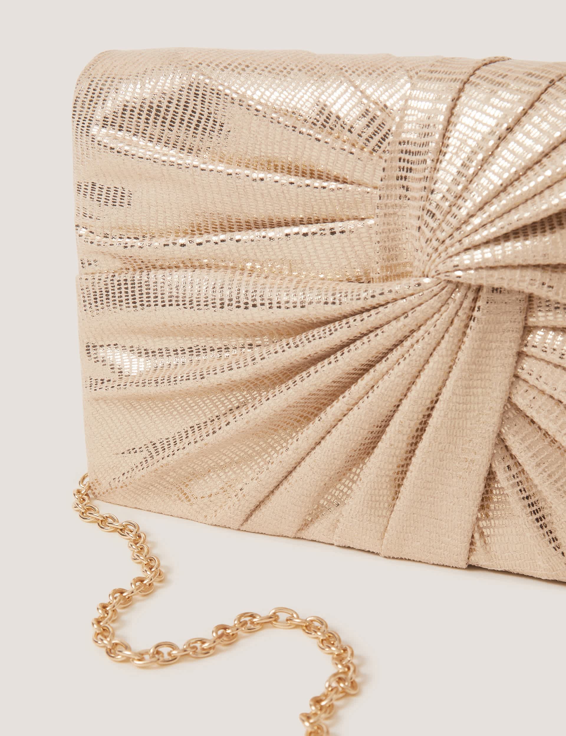 Monsoon metallic twist knot clutch bag, imported from the UK