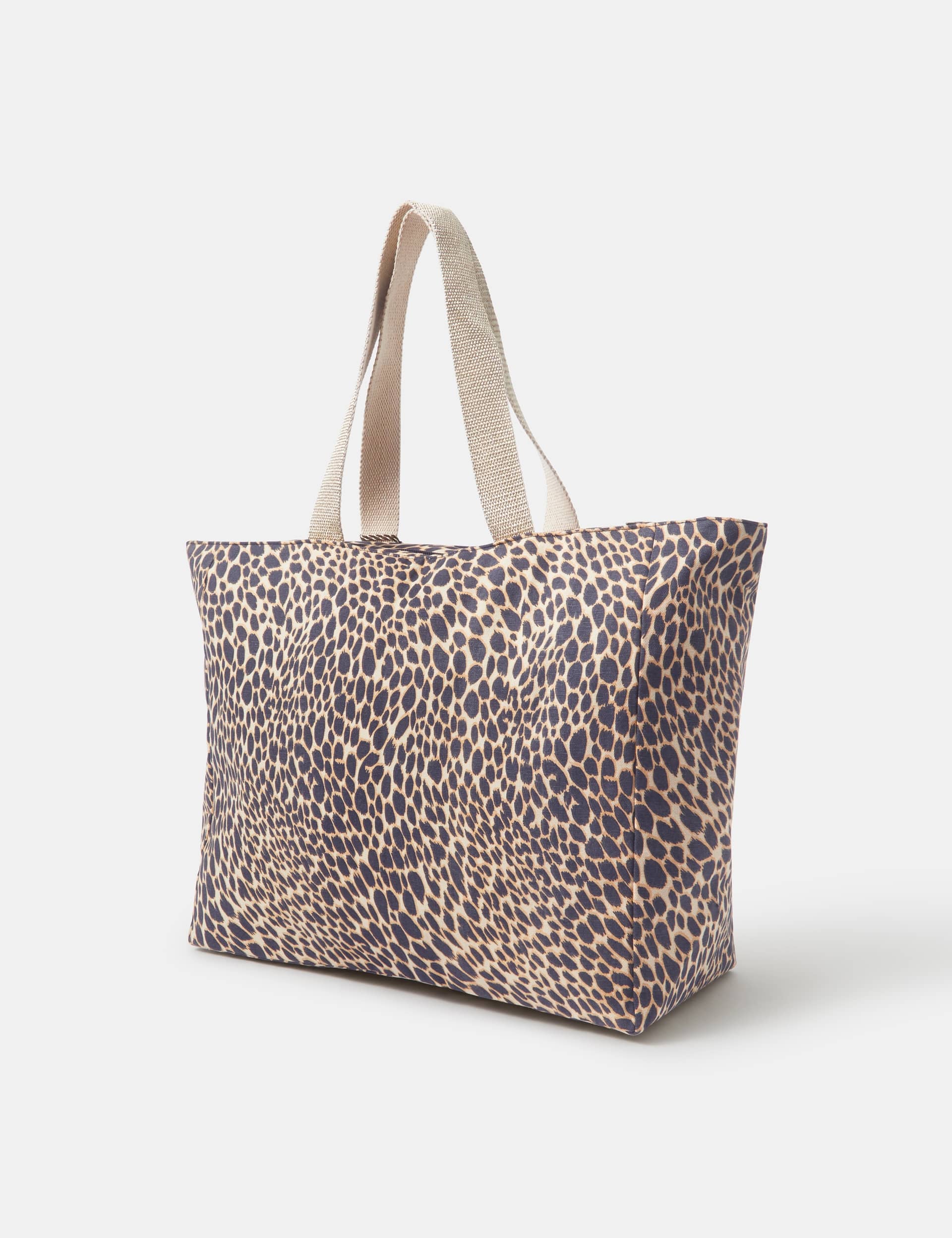 Accessorize leopard print beach bag with metallic handles (British brand)