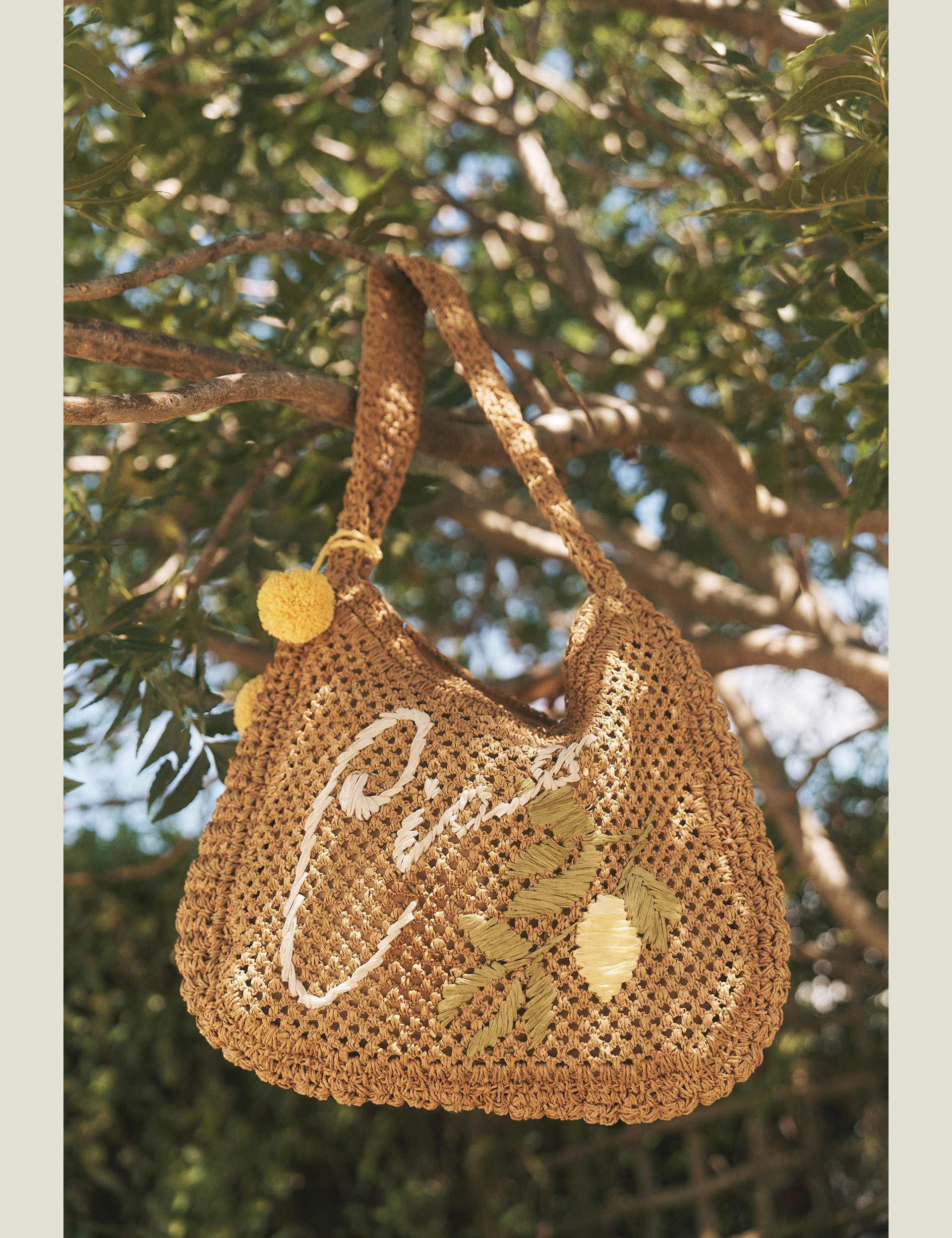 Monsoon woven embroidered shoulder bag with pom pom charm - British product