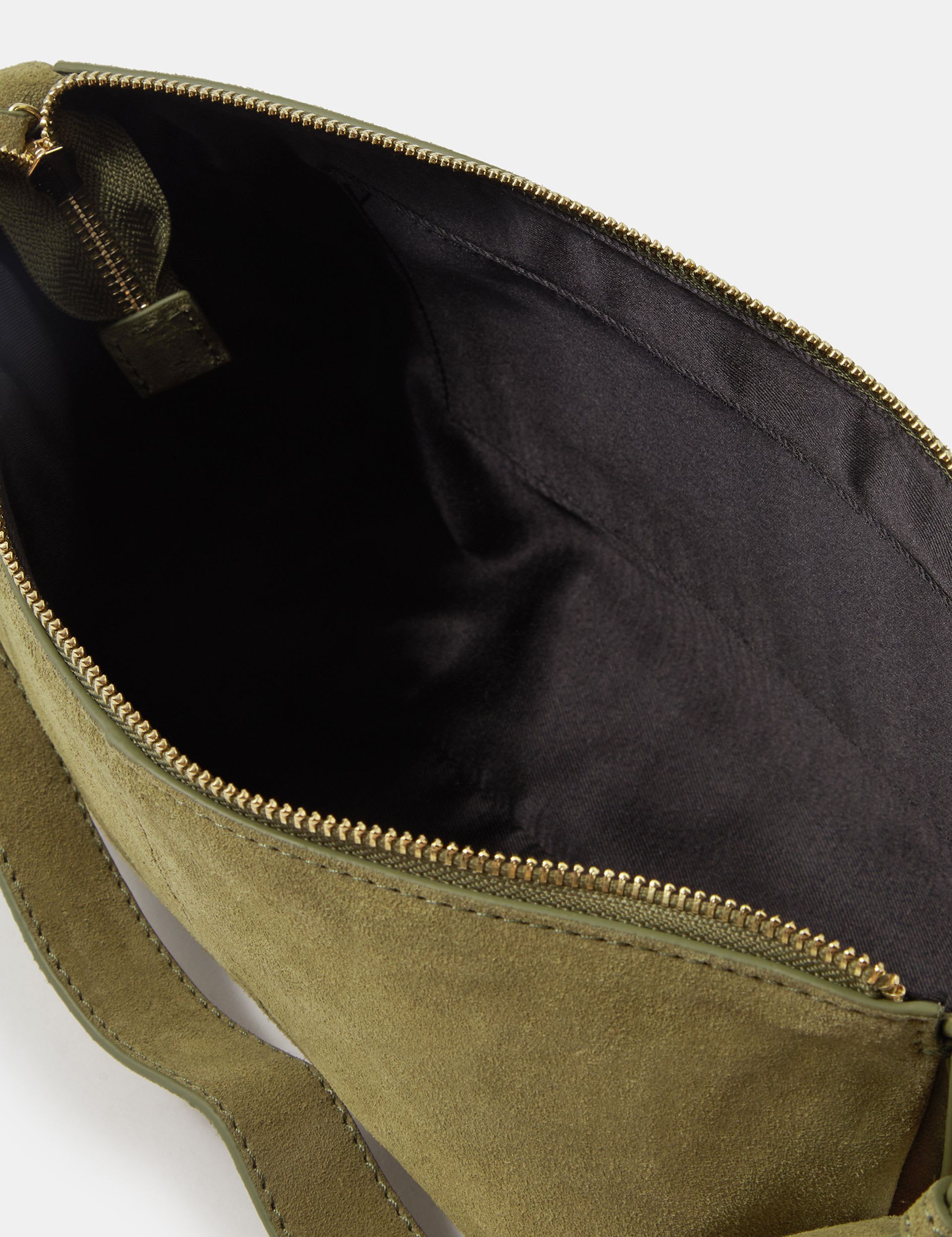 Accessorize suede shoulder bag with zip closure, imported from the UK