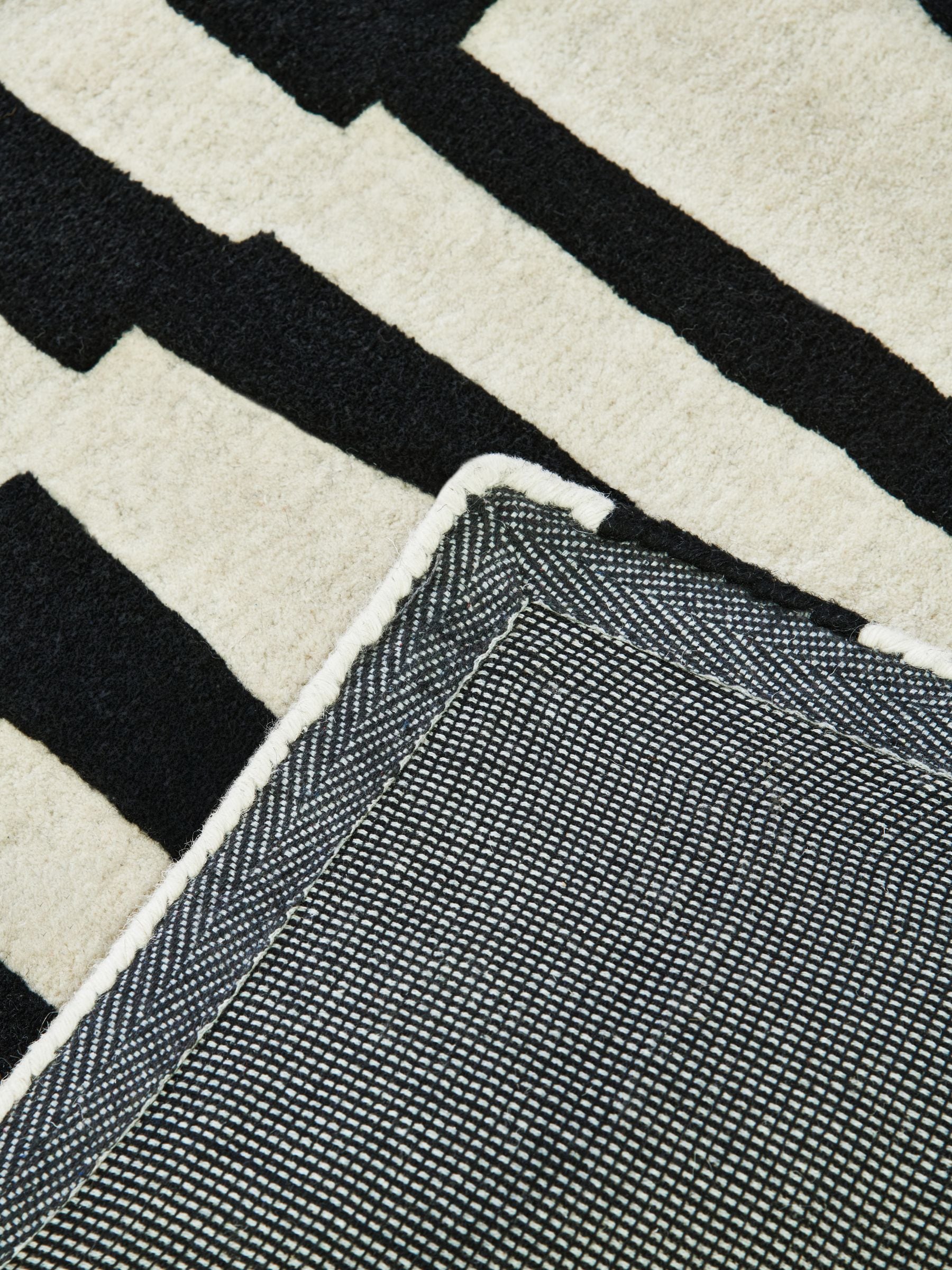 Jasper Conran London monochrome papercut wool tufted rug, UK version