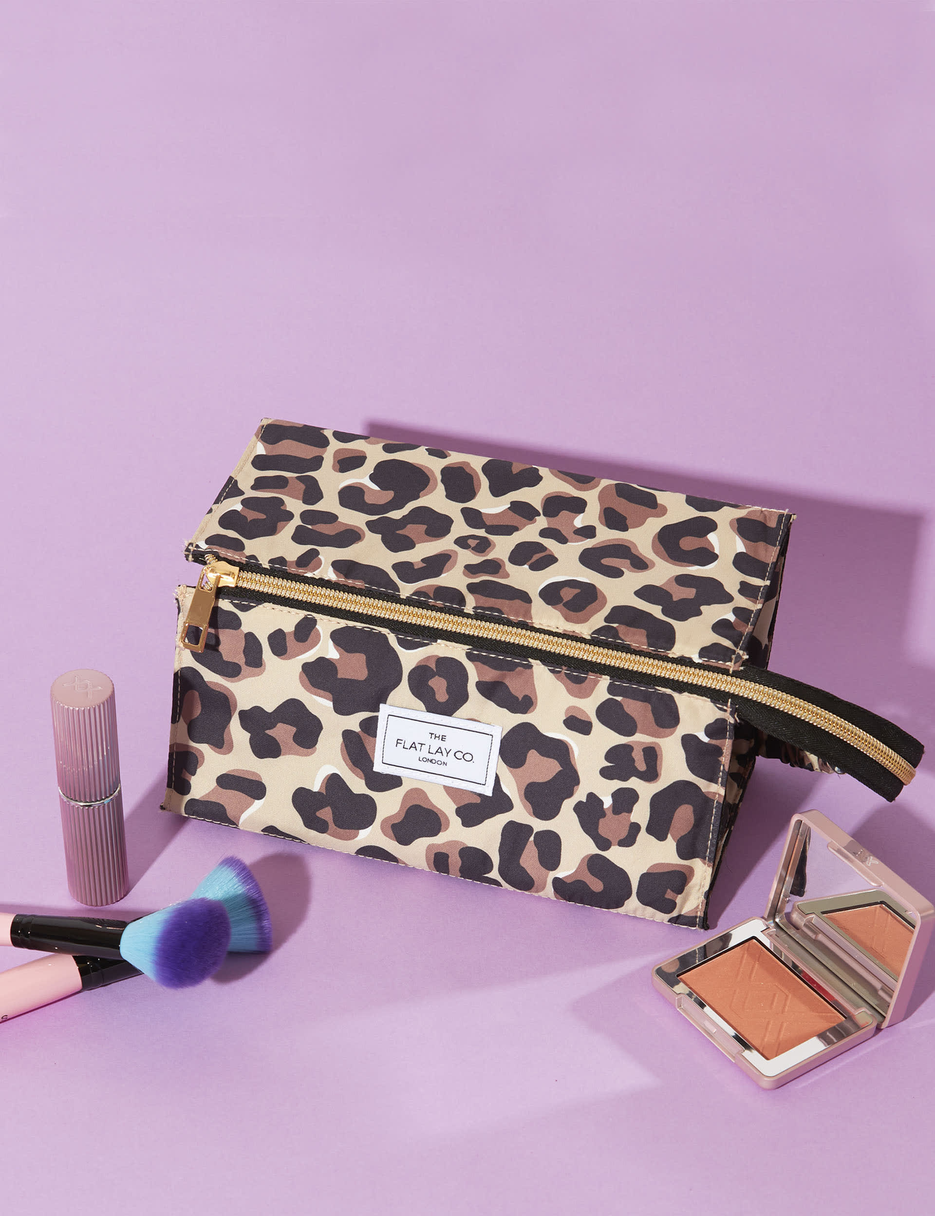The Flat Lay Co. leopard print makeup box bag, imported from the UK