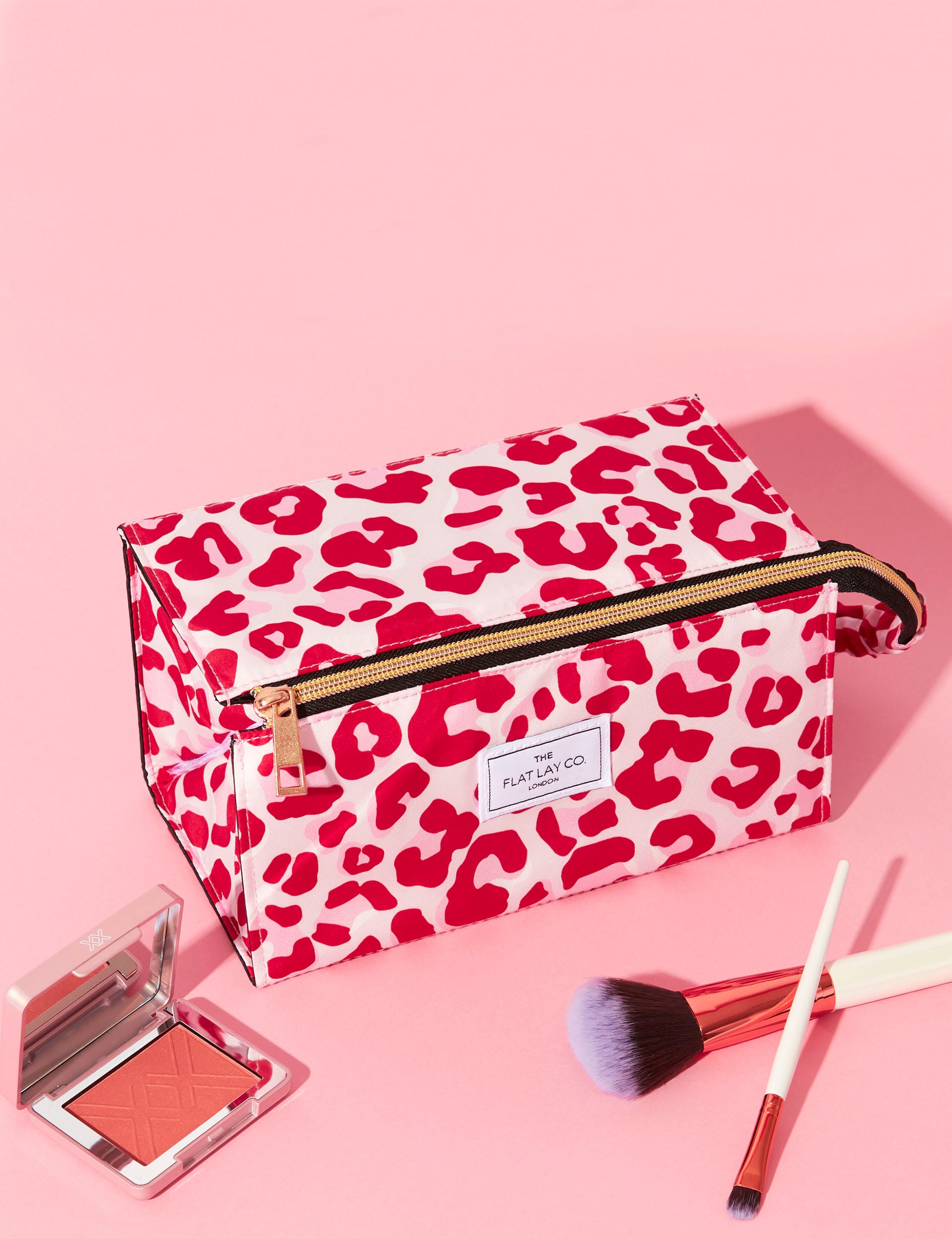Flat Lay Co. pink leopard makeup box bag, imported from the UK