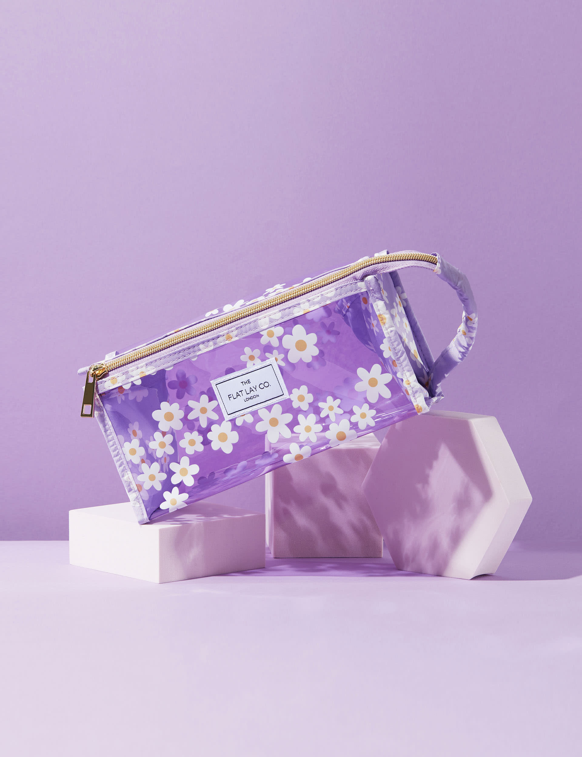 The Flat Lay Co. makeup jelly box bag in lilac daisy imported from the UK
