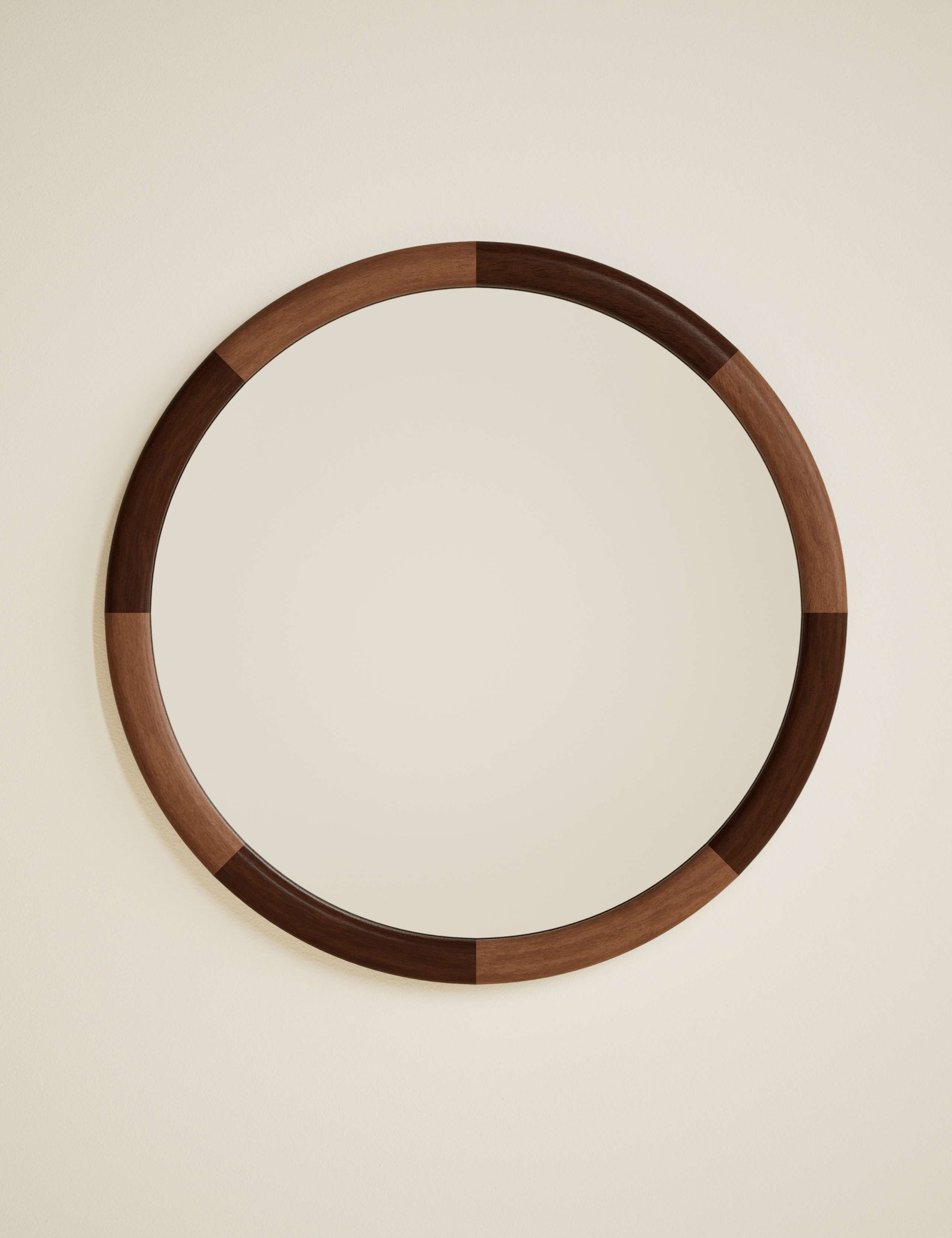 Marlowe round wall mirror with two-tone wood frame, imported from the UK