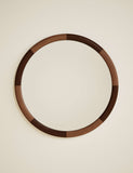 Marlowe round wall mirror with two-tone wood frame, imported from the UK