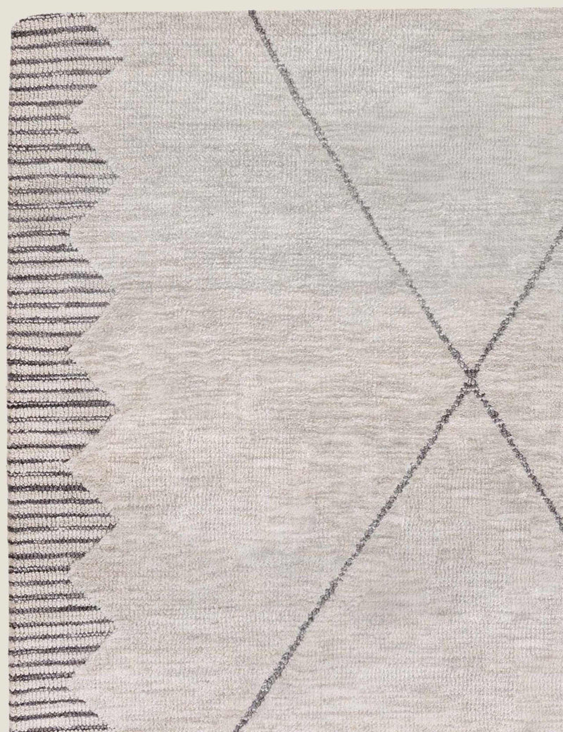 Asiatic Mason rug with bold zig-zag border, imported from the UK