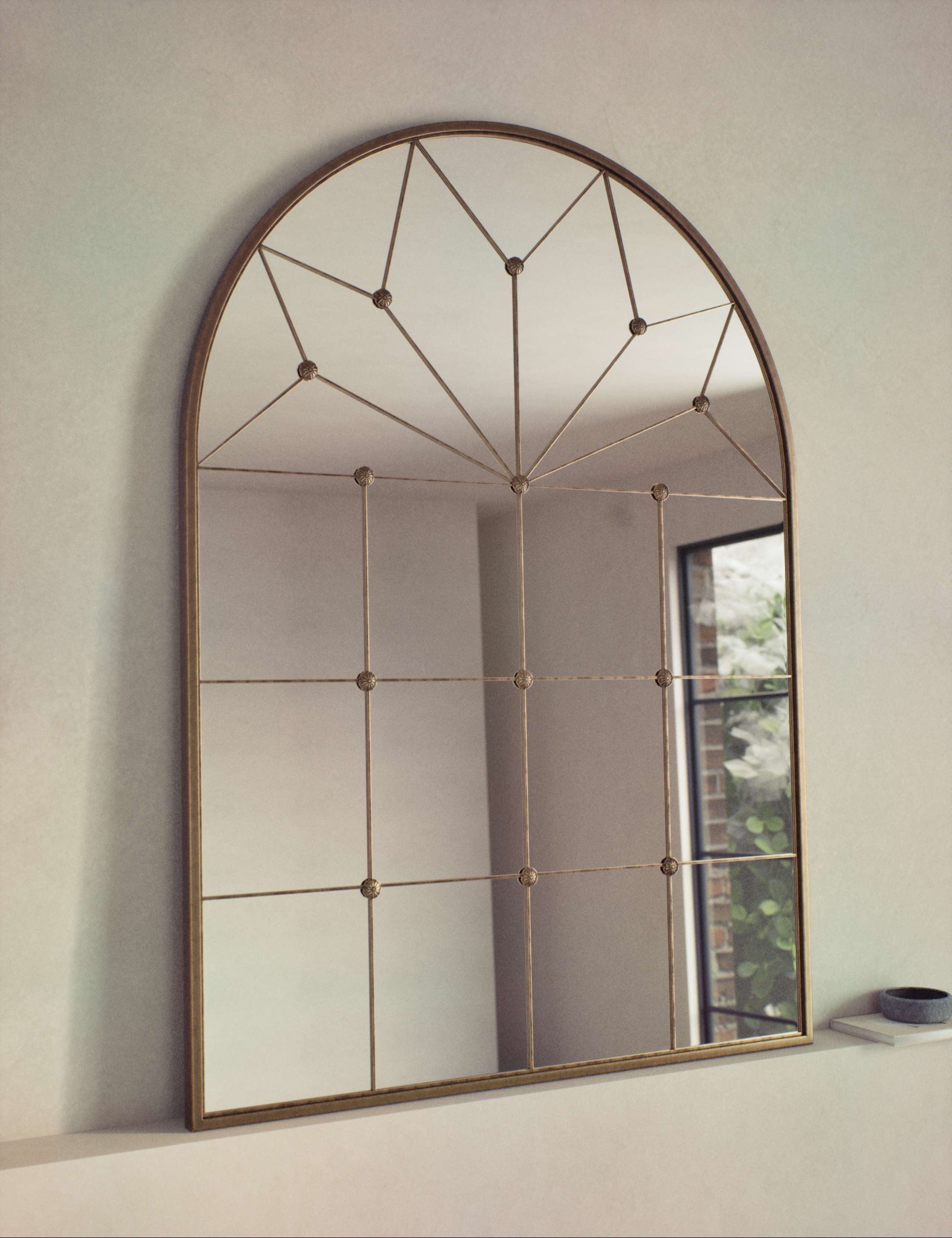 Metal arch wall mirror medium size from a British brand