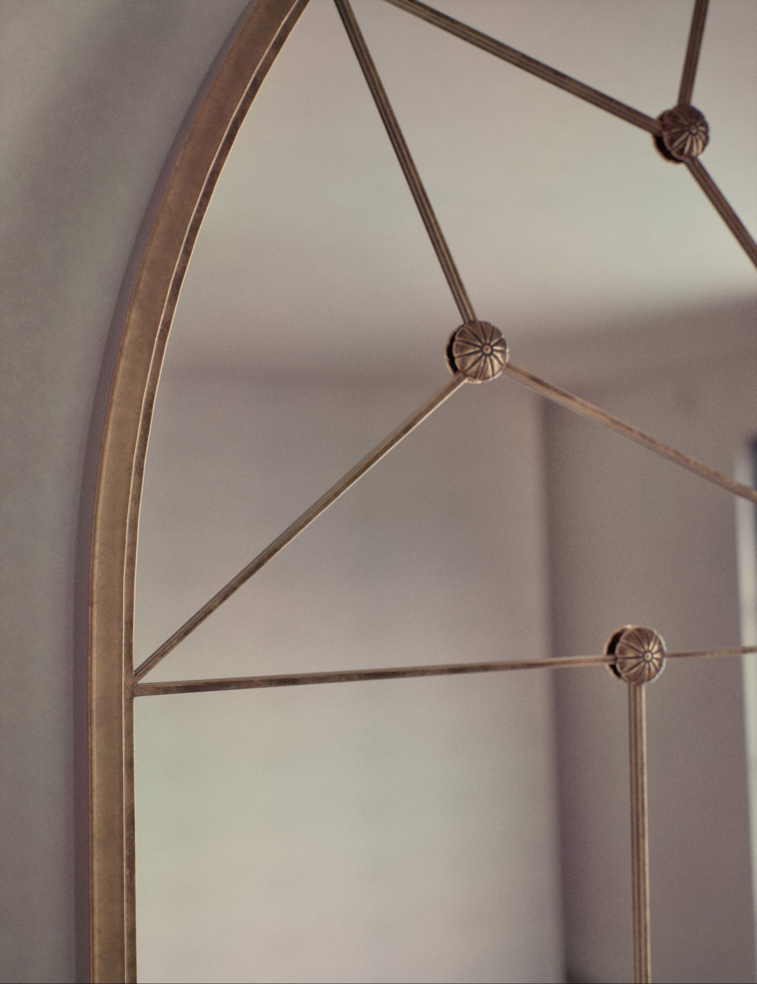 Metal arch wall mirror medium size from a British brand