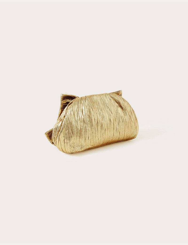 Monsoon metallic bow clutch bag, imported from the UK
