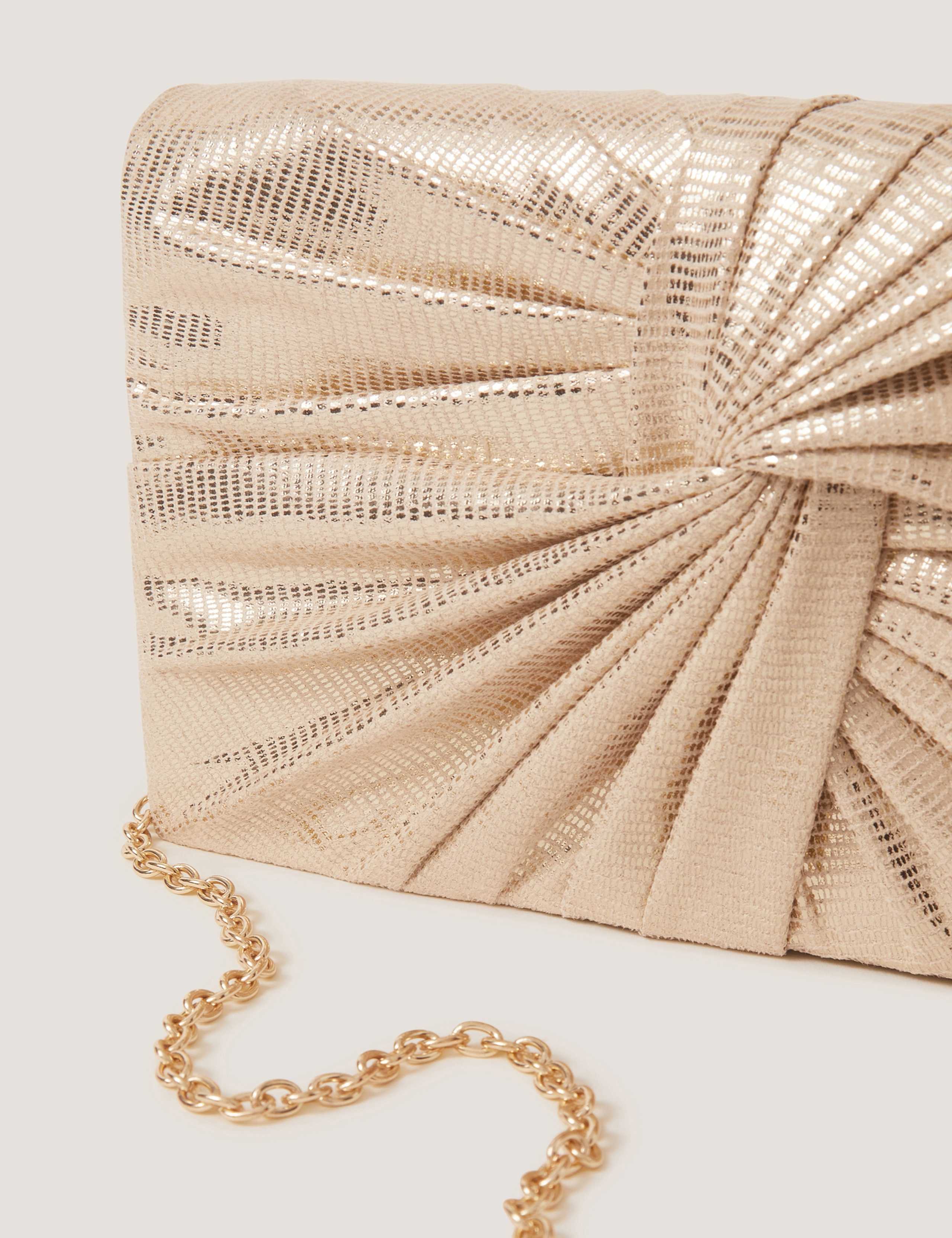 Monsoon metallic twist knot clutch bag, imported from the UK