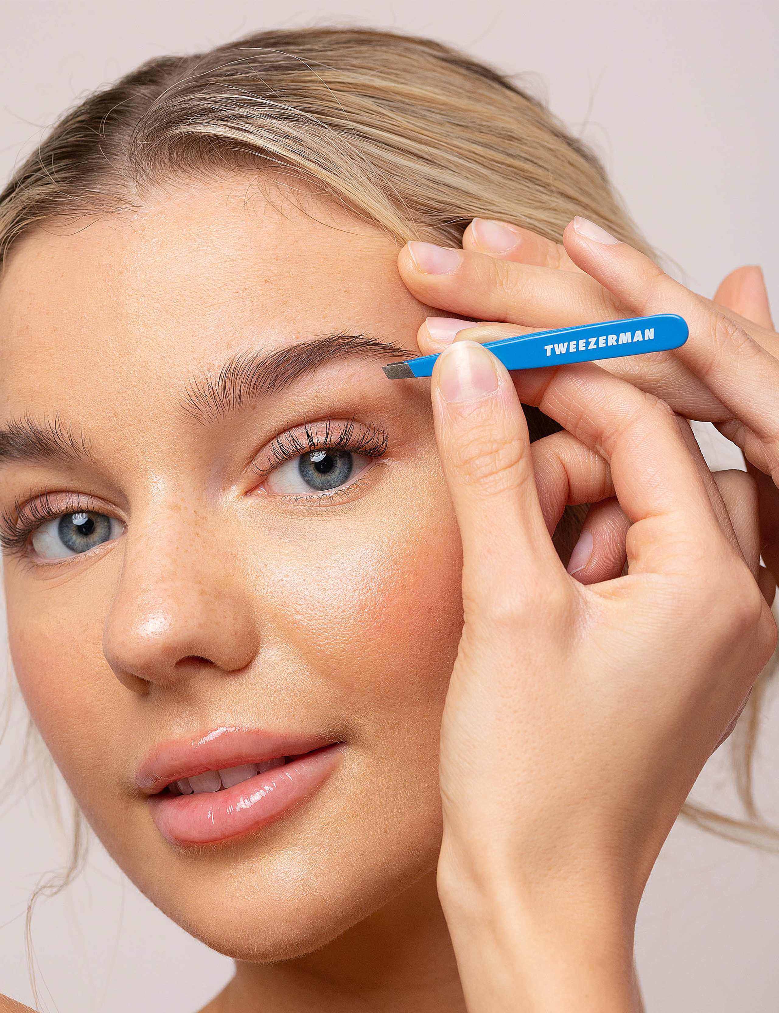 Tweezerman Mini Slant Tweezer Bahama Blue, imported from the UK