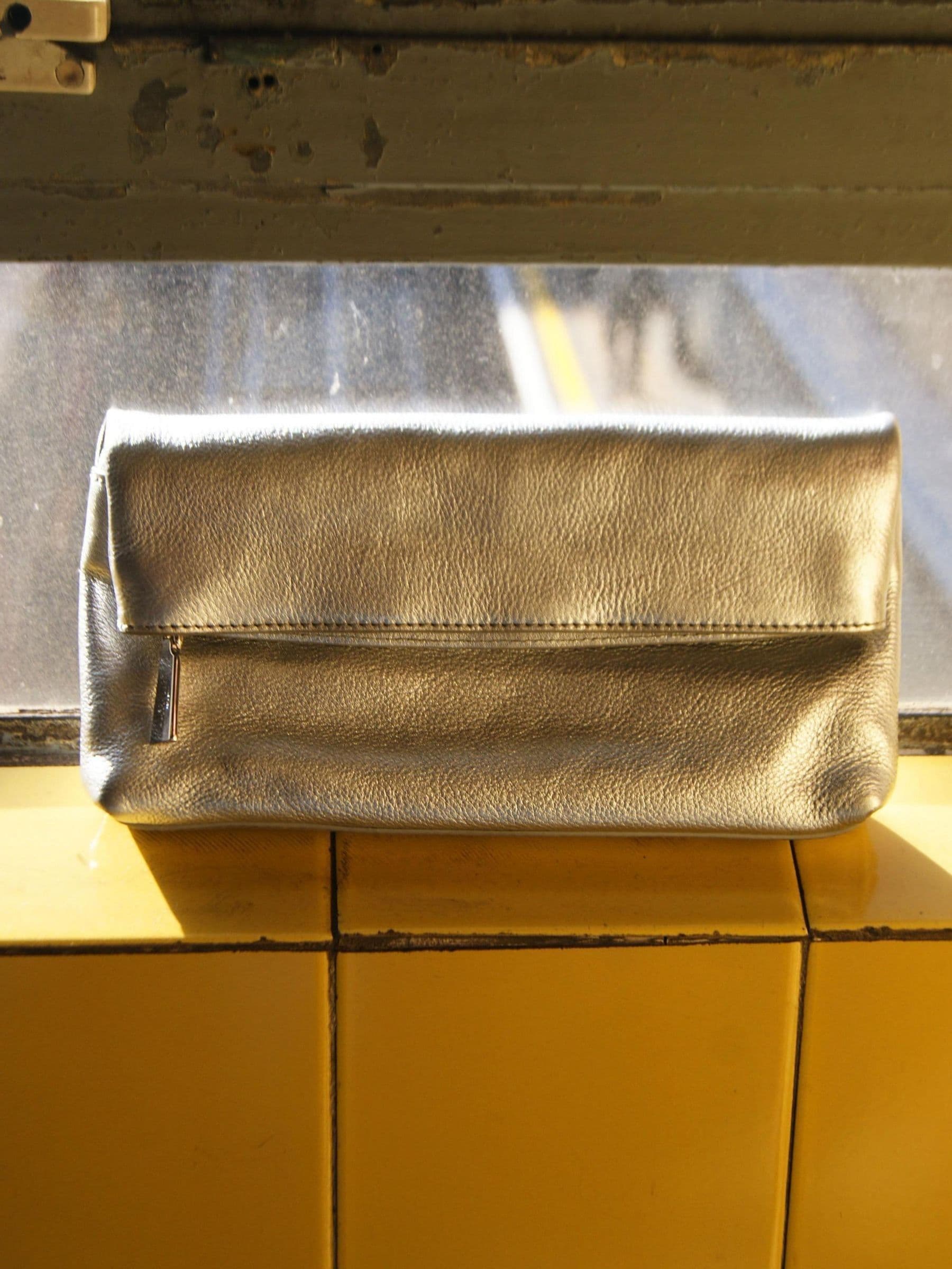 Jones Bootmaker Gold Wylie fold-over clutch bag, UK version