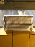 Jones Bootmaker Gold Wylie fold-over clutch bag, UK version