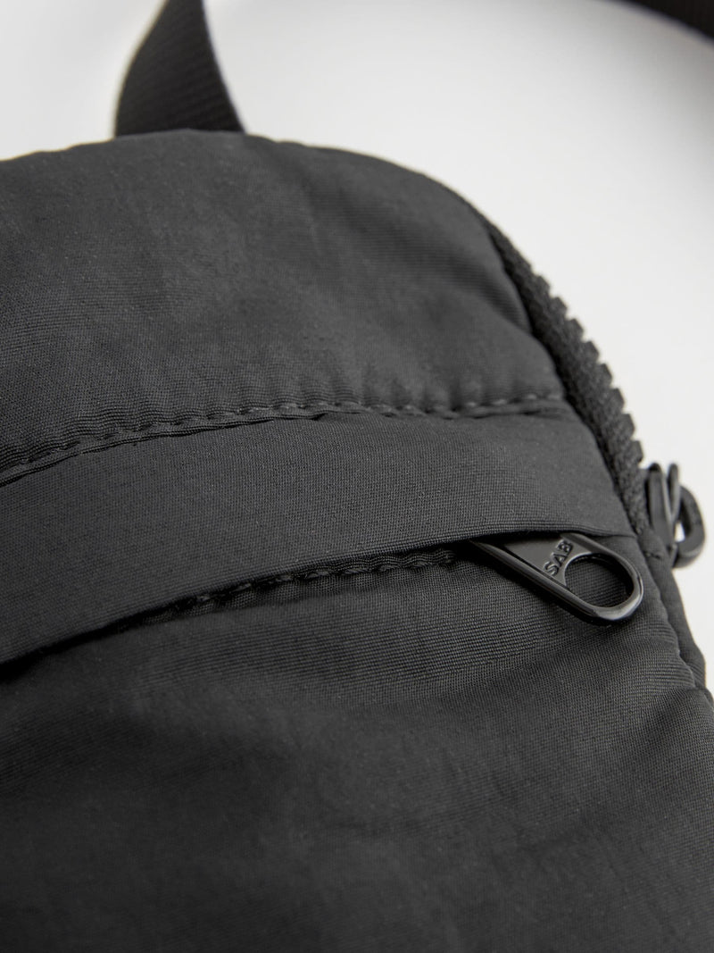 Black mobile phone bag (British brand)