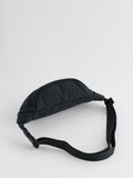 Black cross-body bag with nylon shell and polyester lining, UK version
