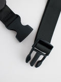 Black cross-body bag with nylon shell and polyester lining, UK version