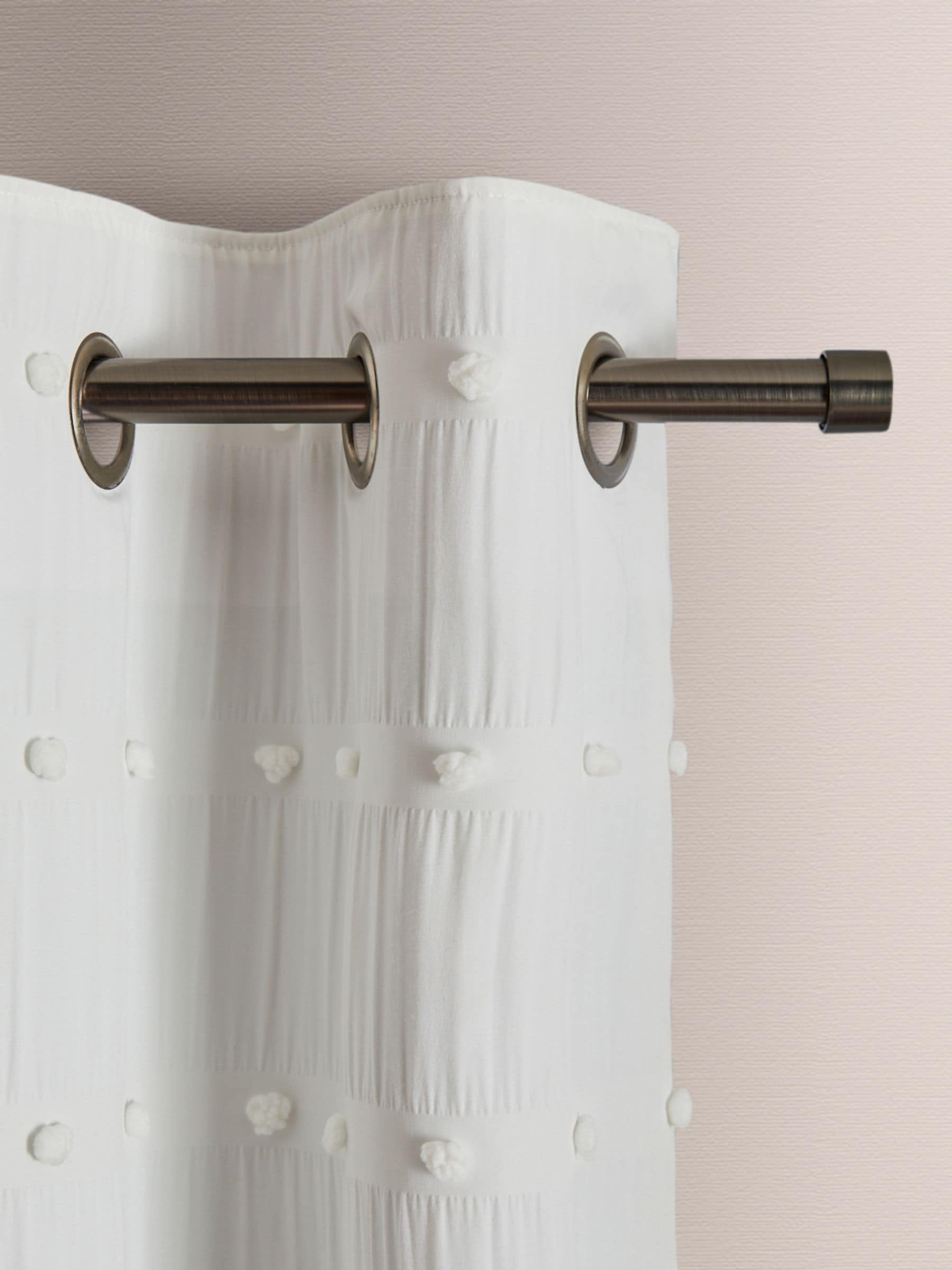 White bobble blackout curtains with eyelet fixture, UK version