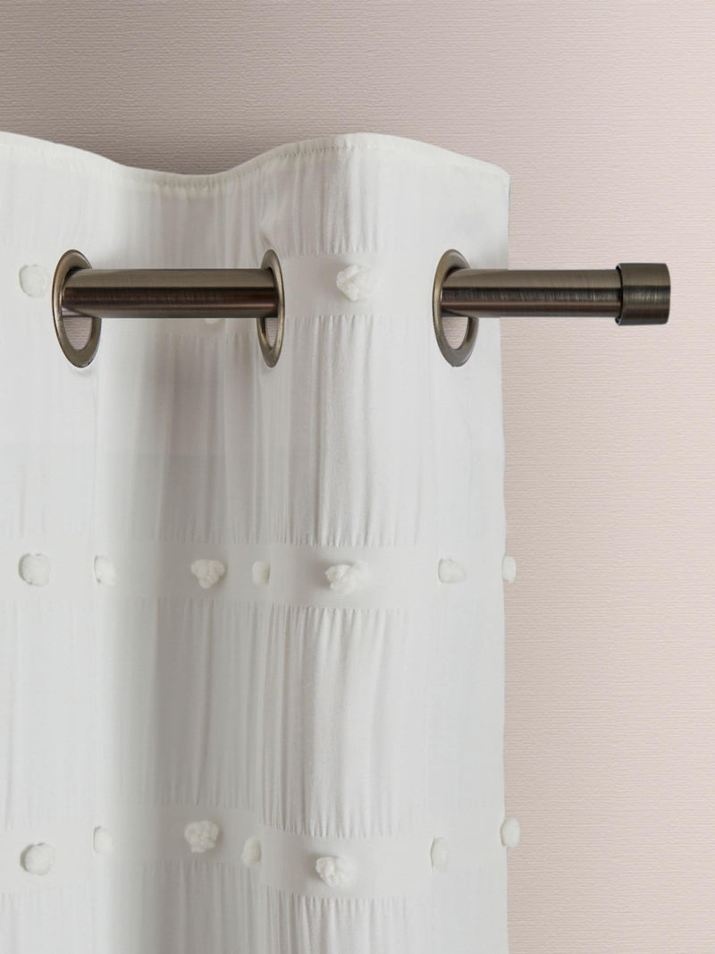 White bobble blackout curtains with eyelet fixture, UK version