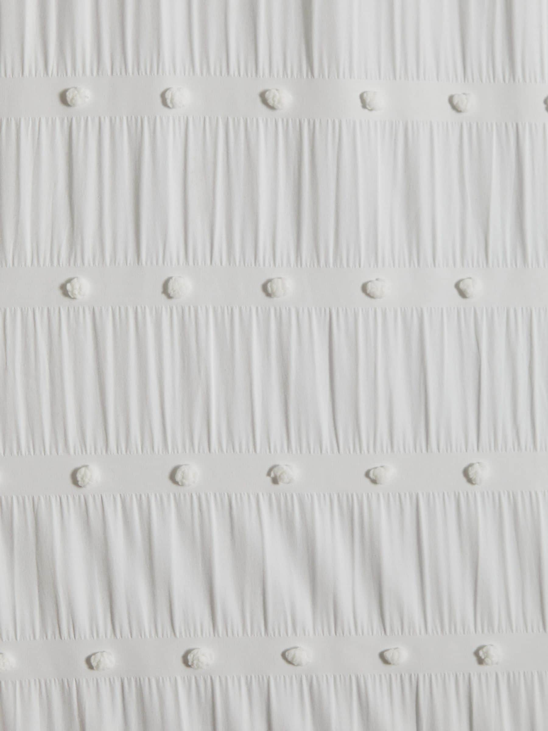 White bobble blackout curtains with eyelet fixture, UK version