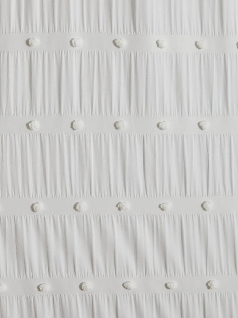 White bobble blackout curtains with eyelet fixture, UK version