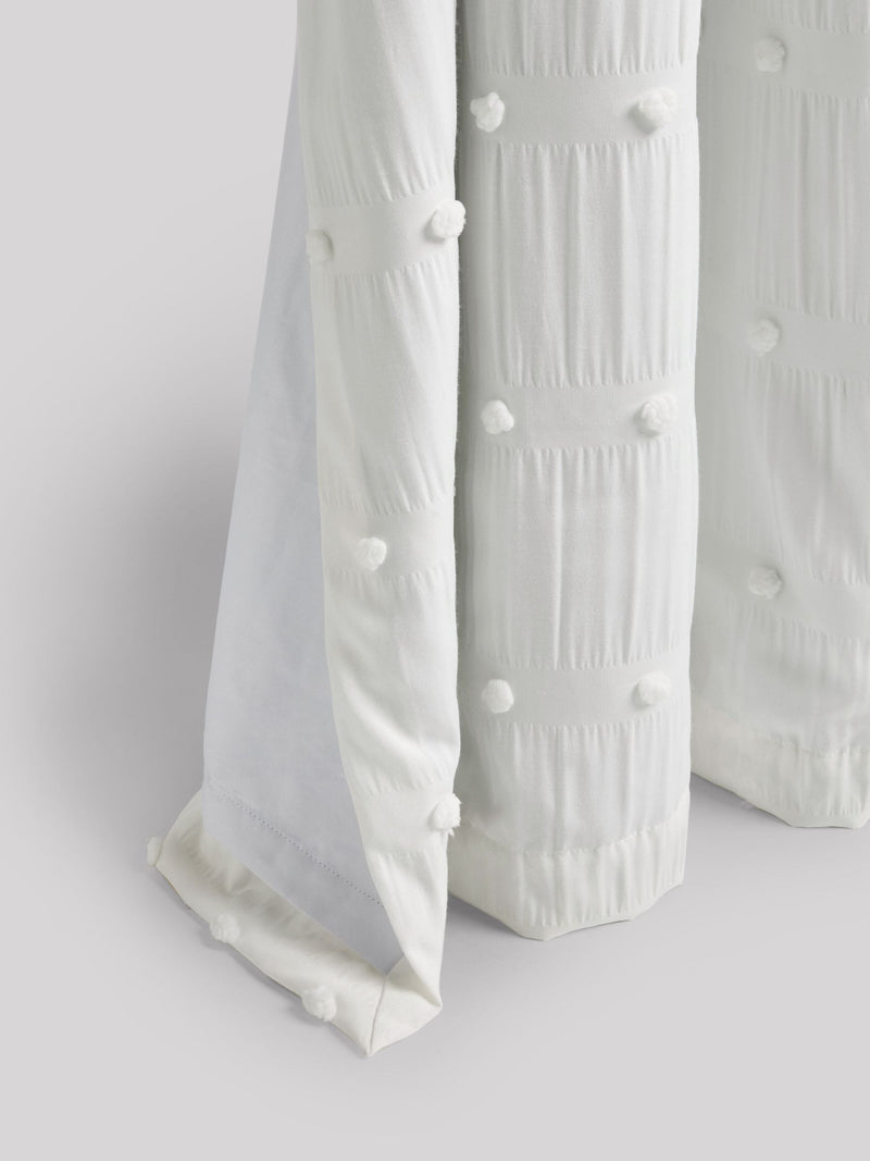 White bobble blackout curtains with eyelet fixture, UK version
