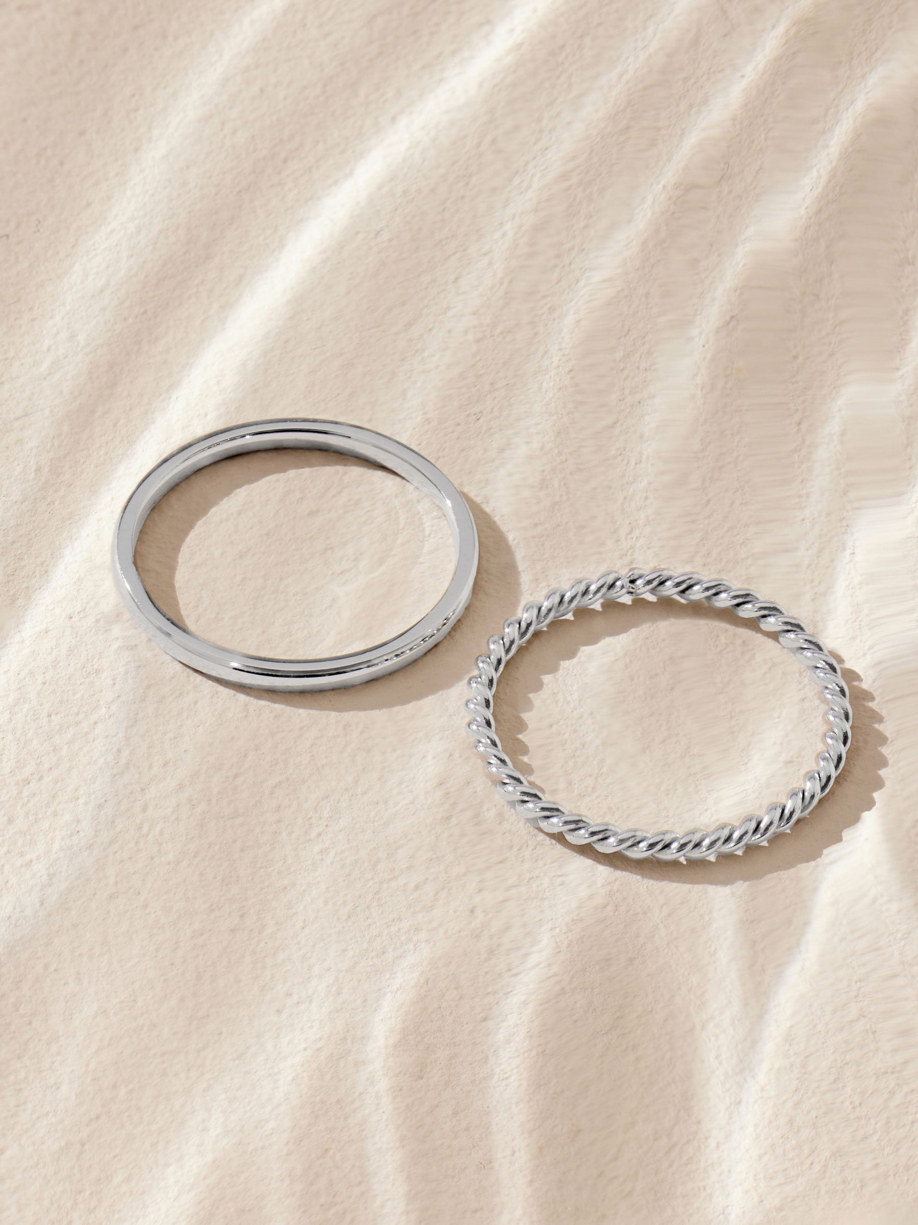 Stainless steel delicate rings silver tone set of 2 (British brand)