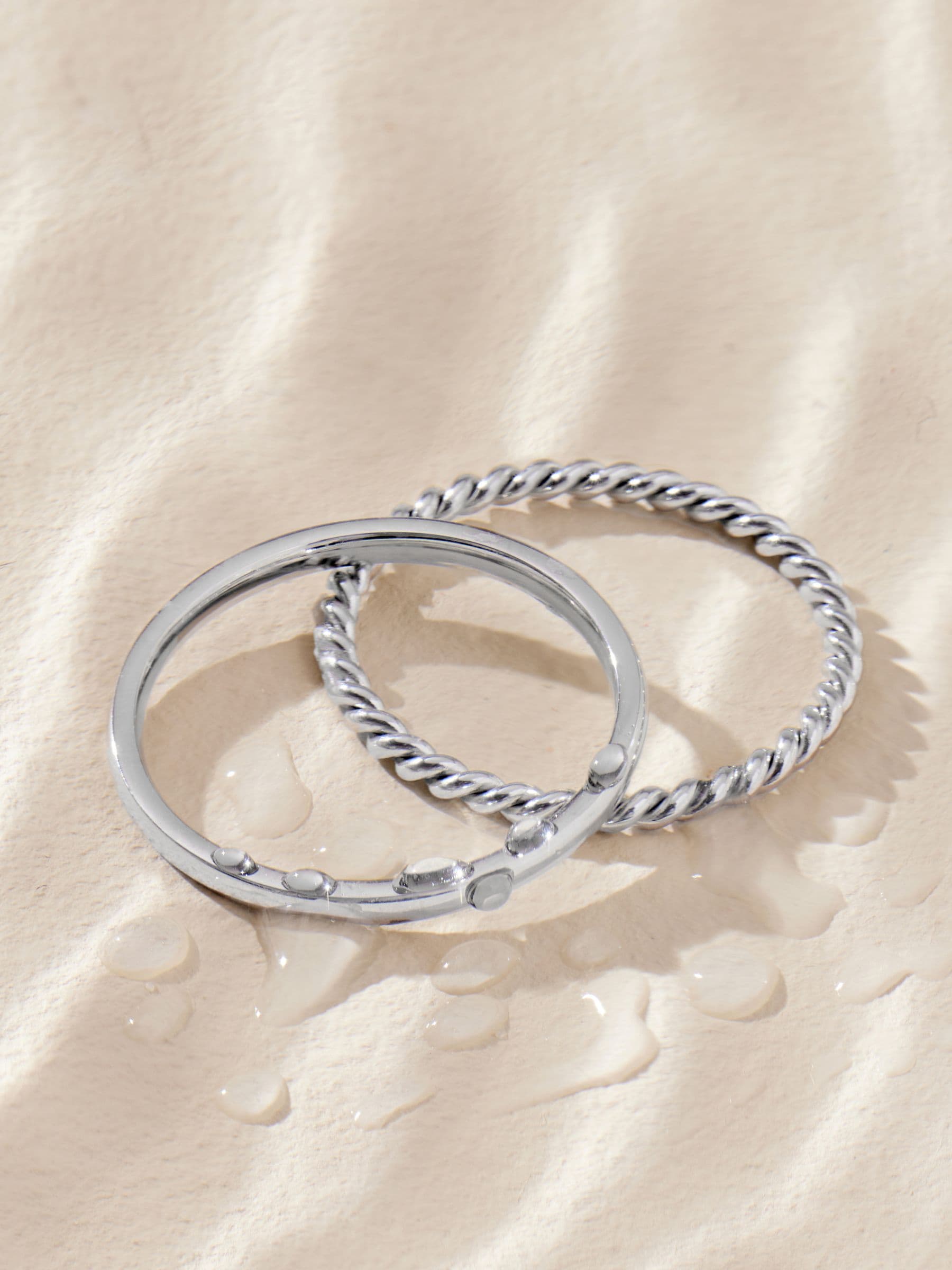 Stainless steel delicate rings silver tone set of 2 (British brand)