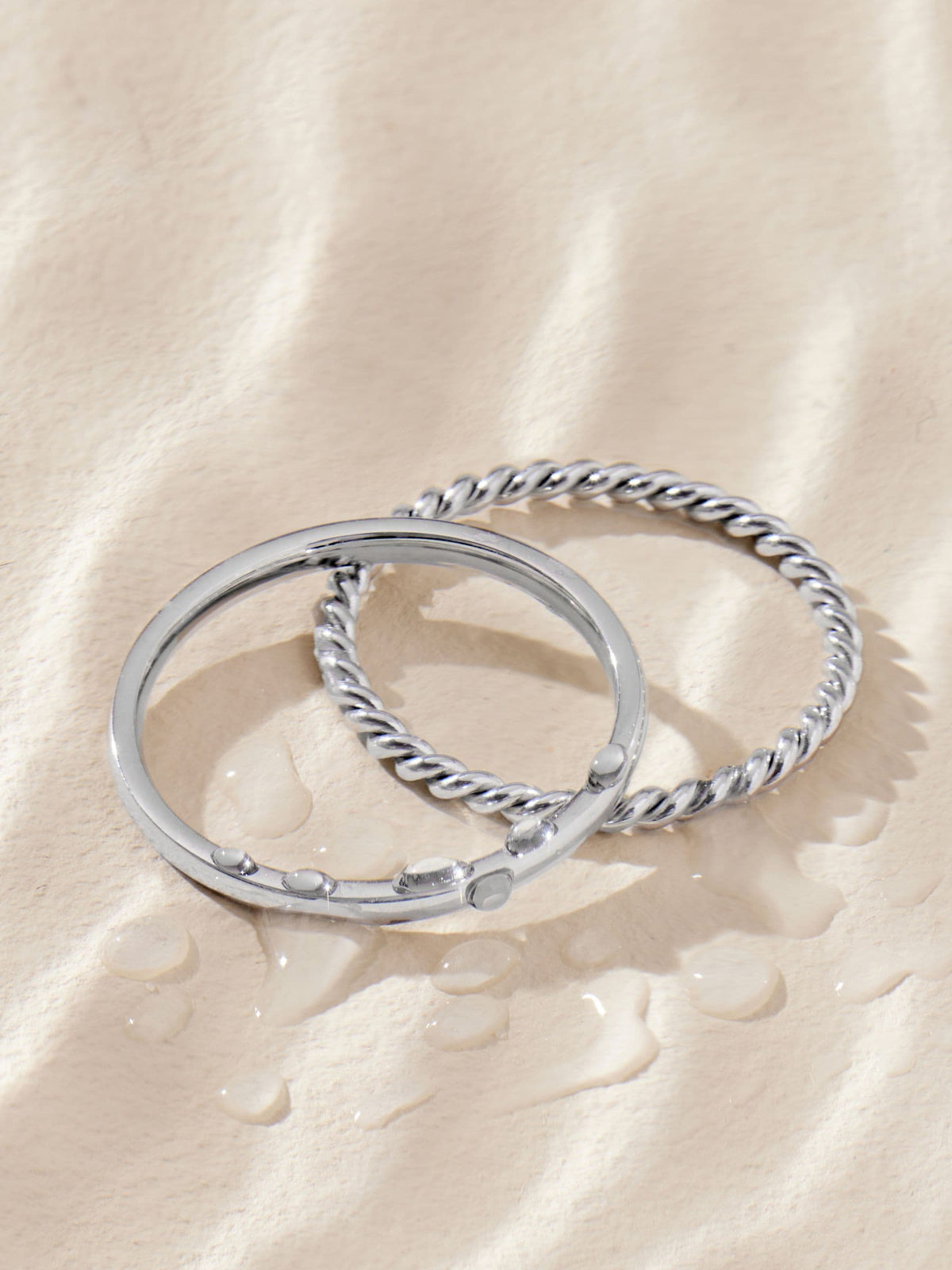 Stainless steel delicate rings silver tone set of 2 (British brand)