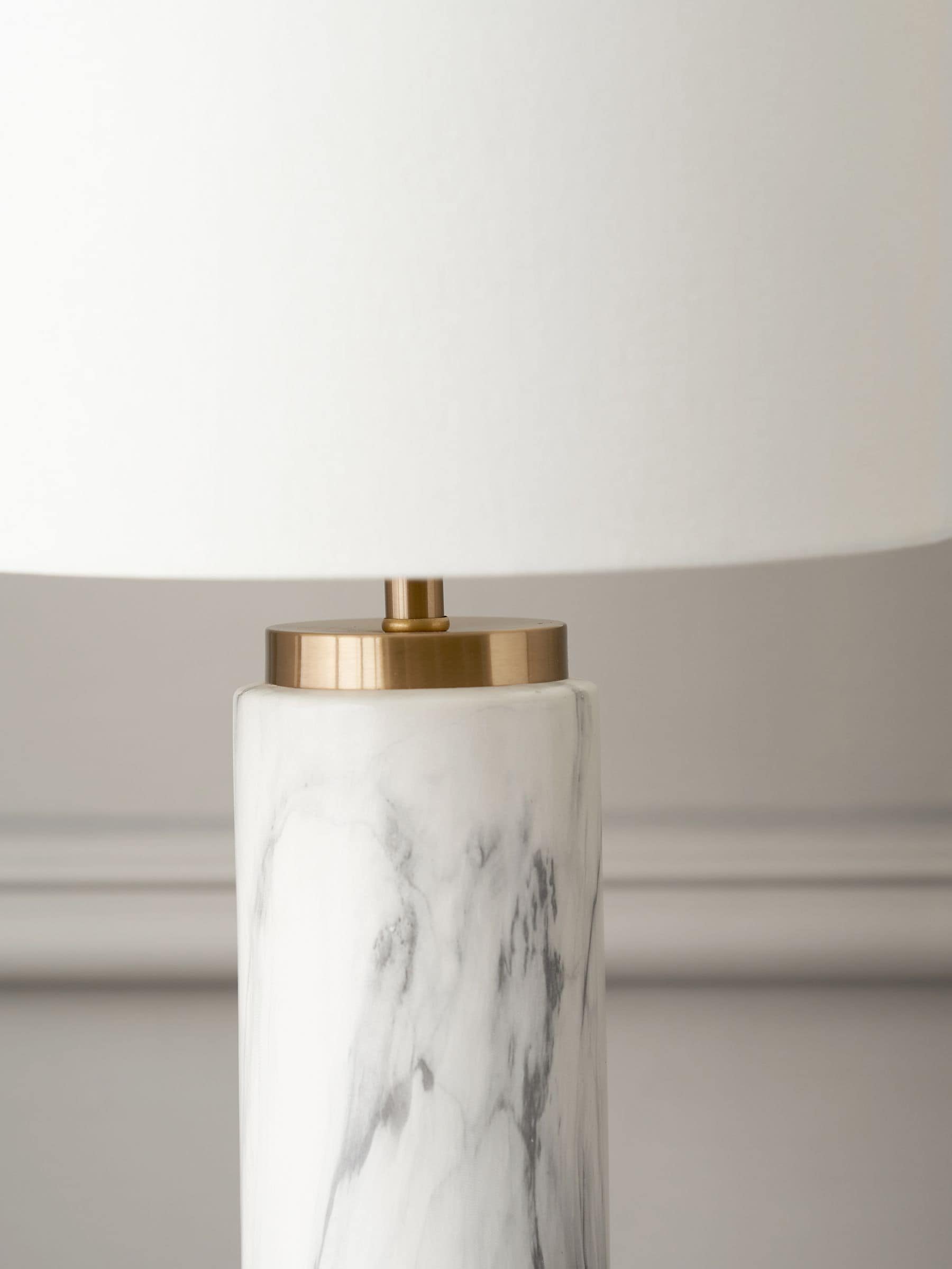 Pacific white Carrara marble effect ceramic tall table lamp, imported from the UK