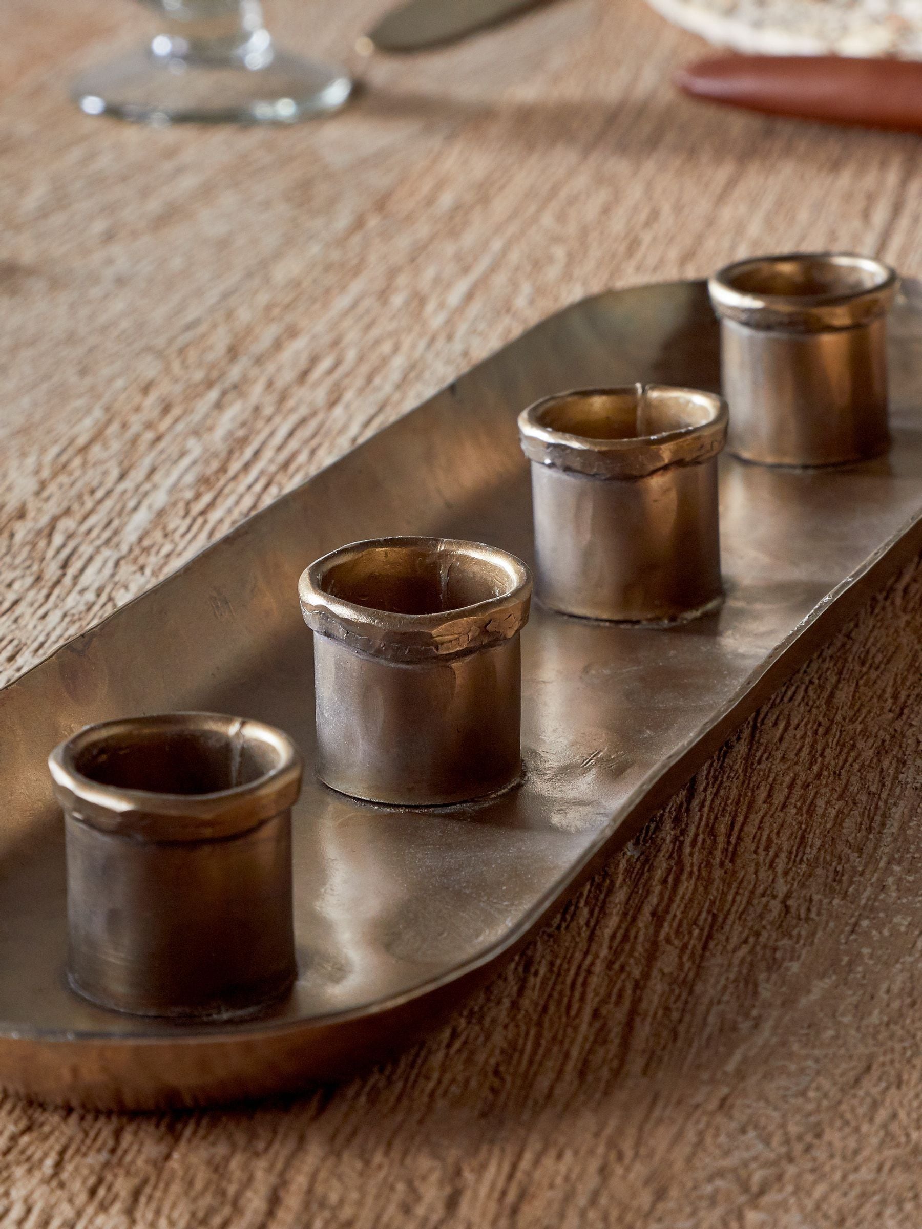Nkuku antique brass long candle holder (British brand)