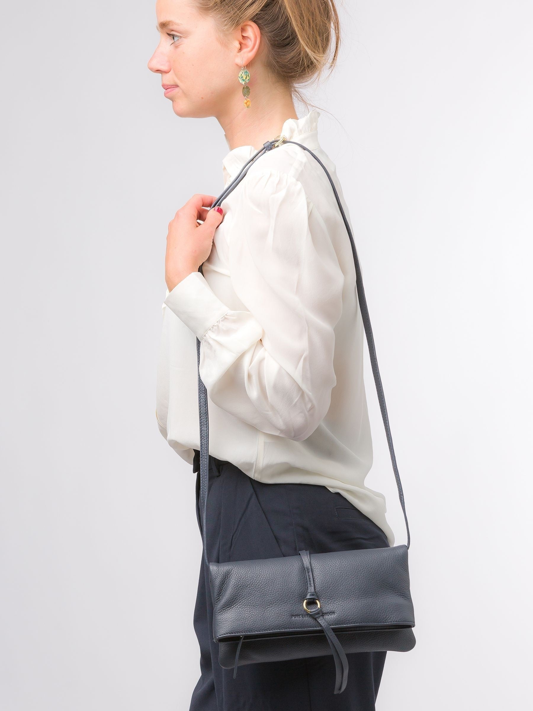 Pure Luxuries London blue Selene Nappa leather clutch bag, UK version
