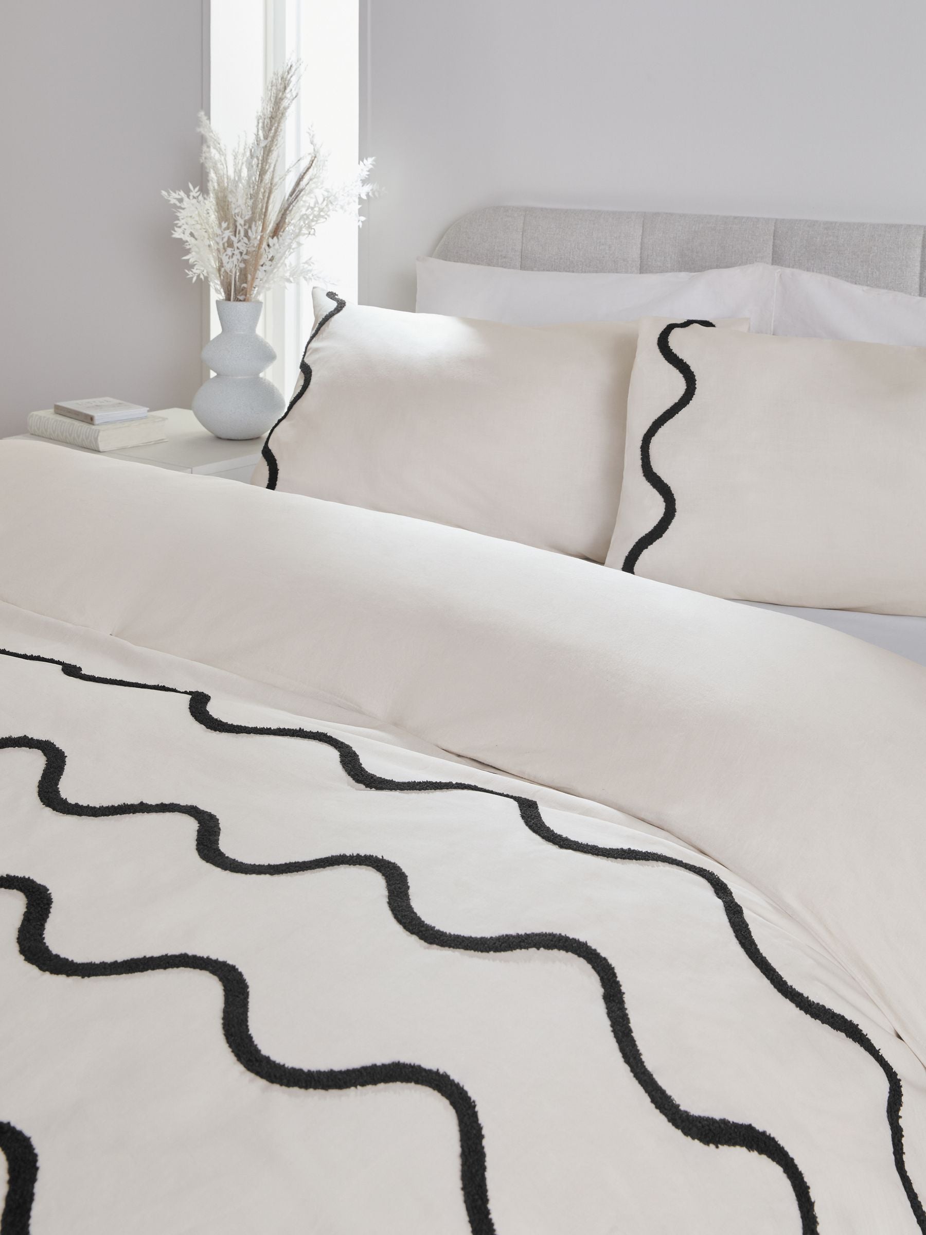 Monochrome tufted wave duvet cover and pillowcase set, imported from the UK
