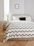 Monochrome tufted wave duvet cover and pillowcase set, imported from the UK