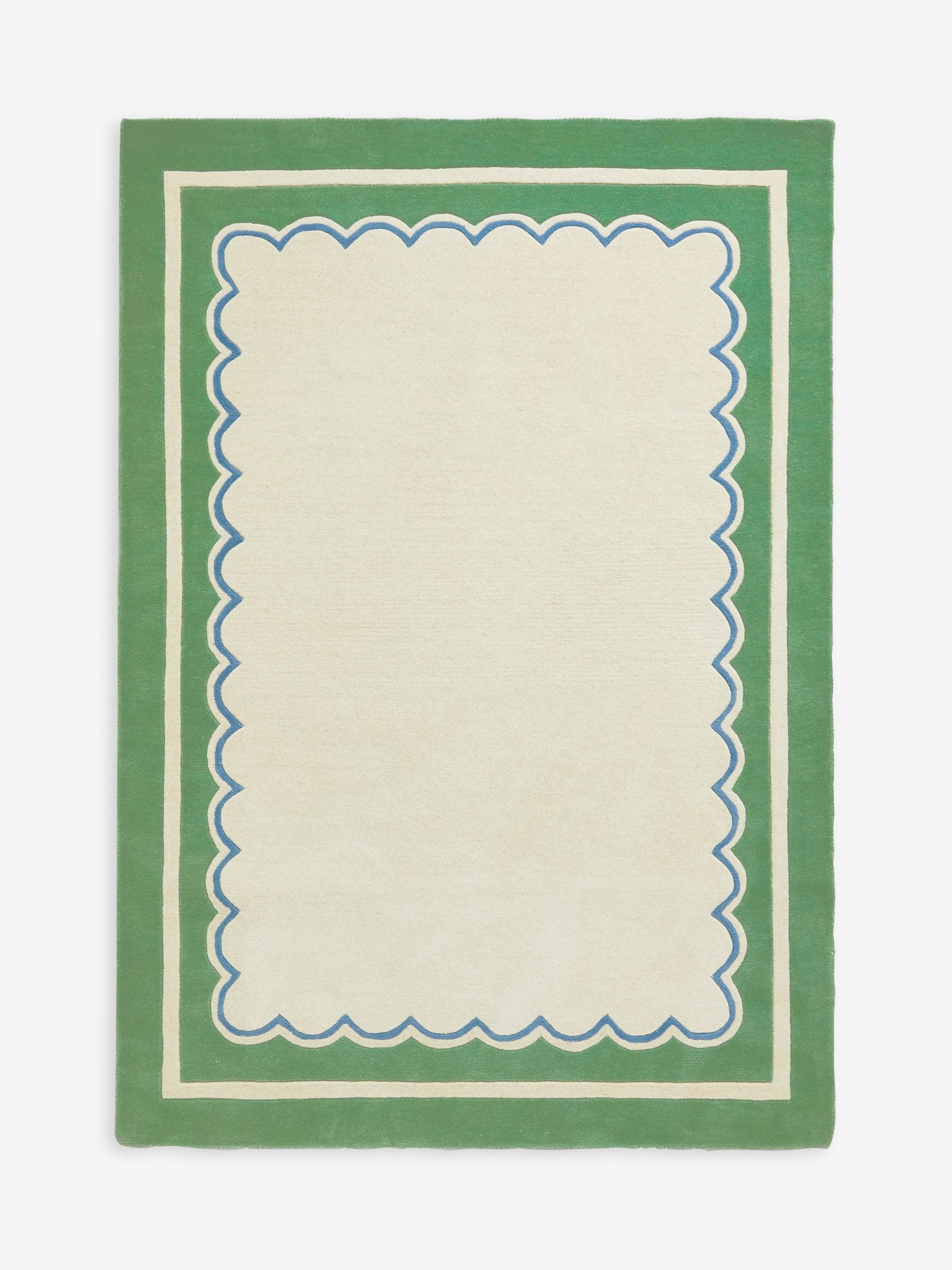 Joules sage green wool rug with scalloped border, imported from the UK
