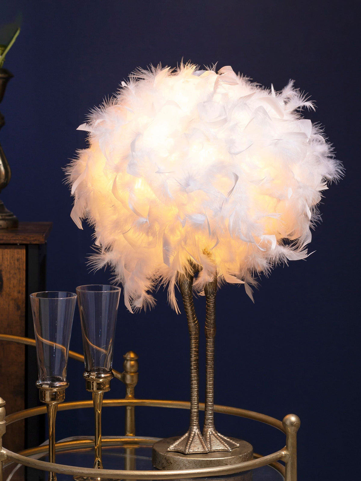 BHS gold ostrich leg table lamp with feather shade (British brand)