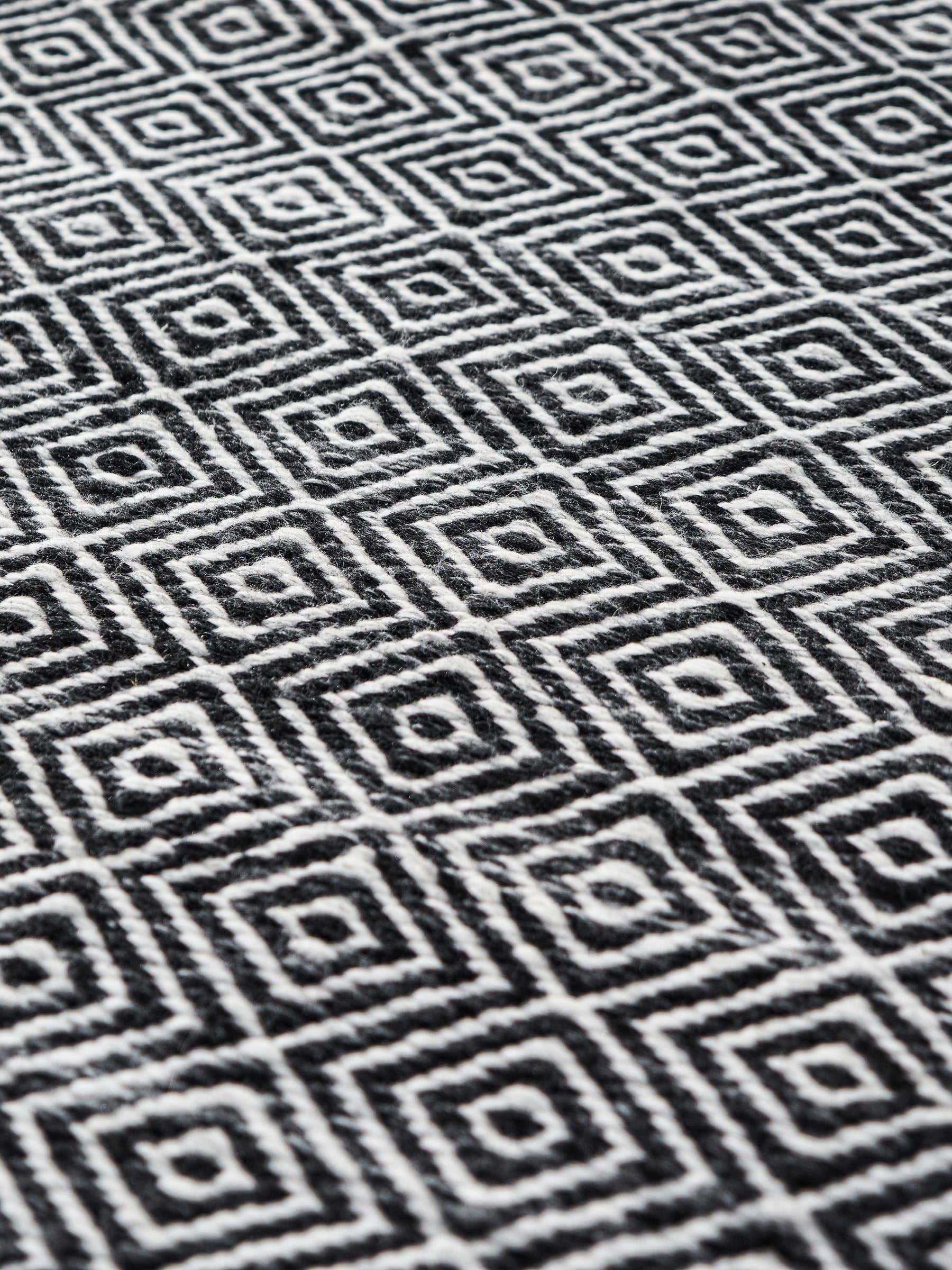 Pacific Inca design rectangular rug black white PET yarn, UK version