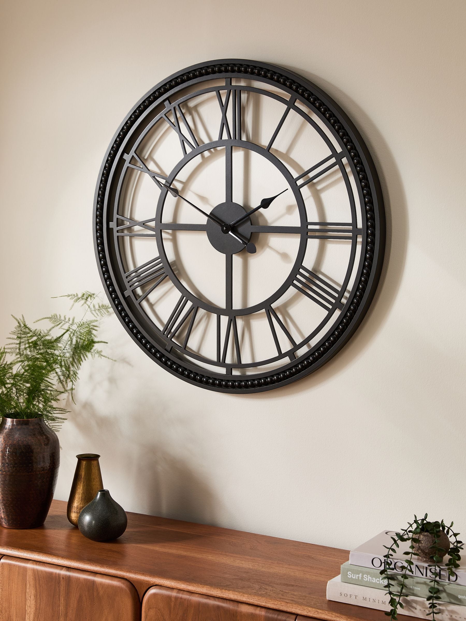 Black bobbin wall clock with 75cm diameter - British product