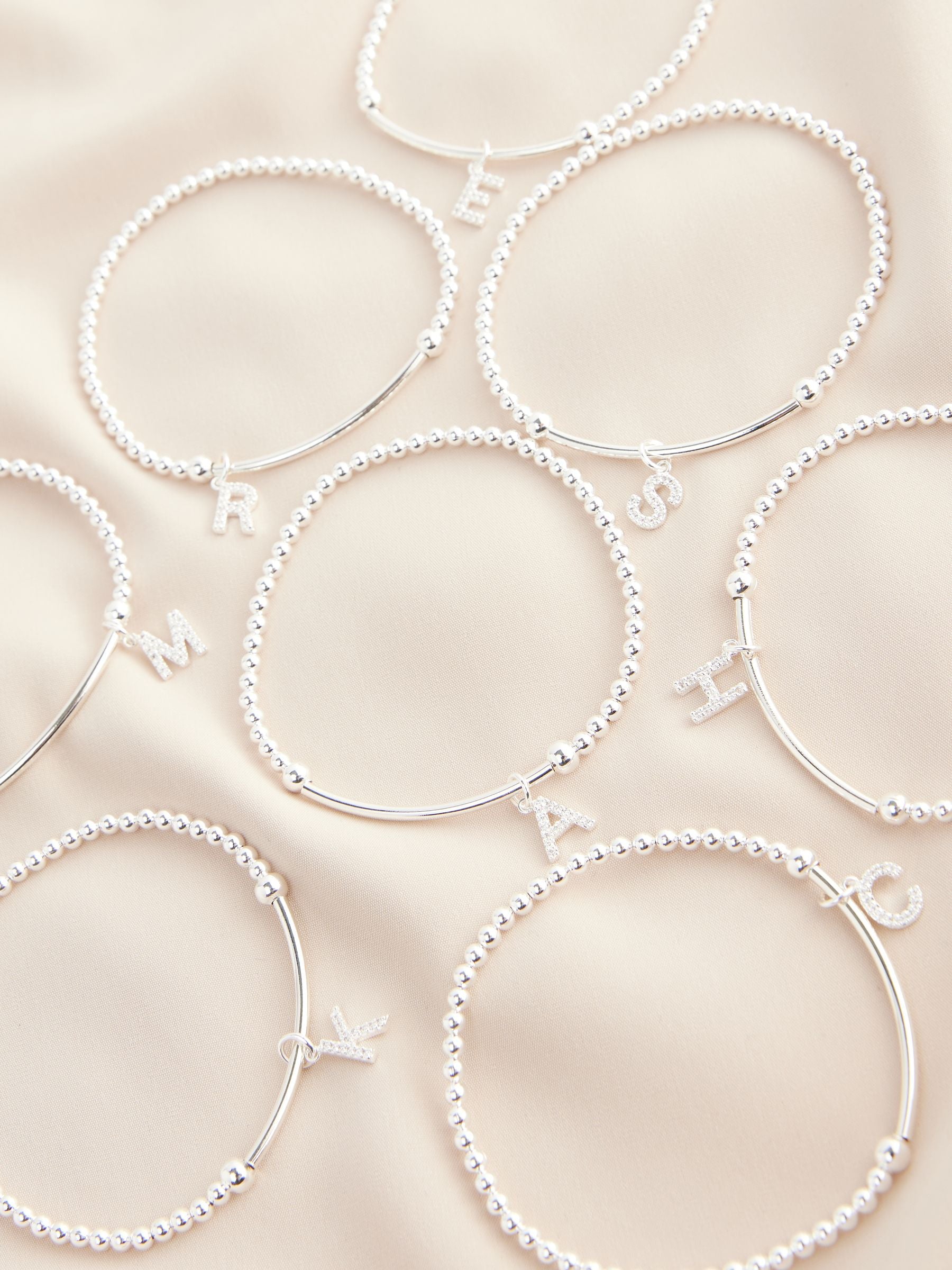 Sterlingsilber-Armband mit initialen Zirkonia-Perlen (britische Marke)