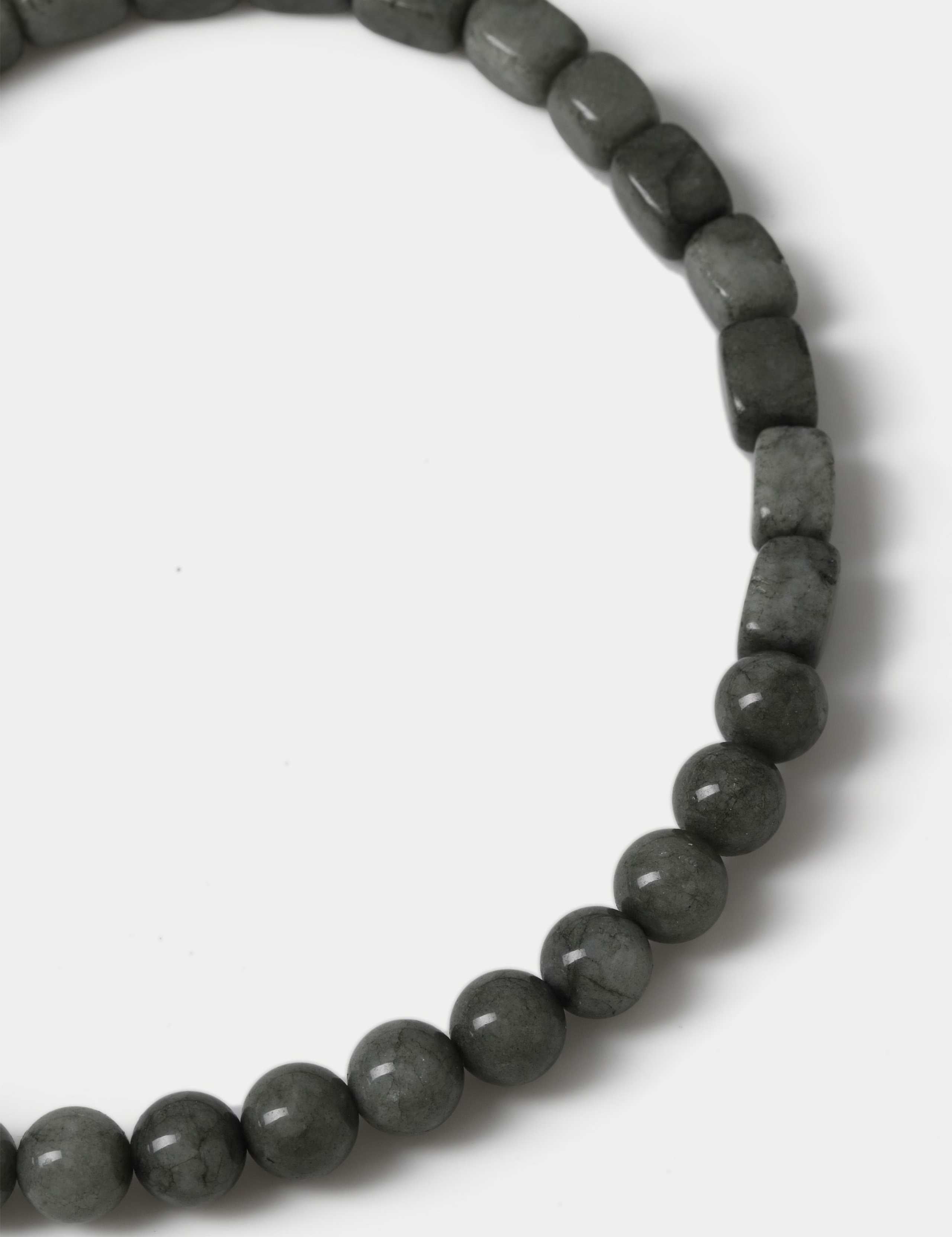 Natural stone tear drop necklace with 95% stone and metal clasp, imported from the UK