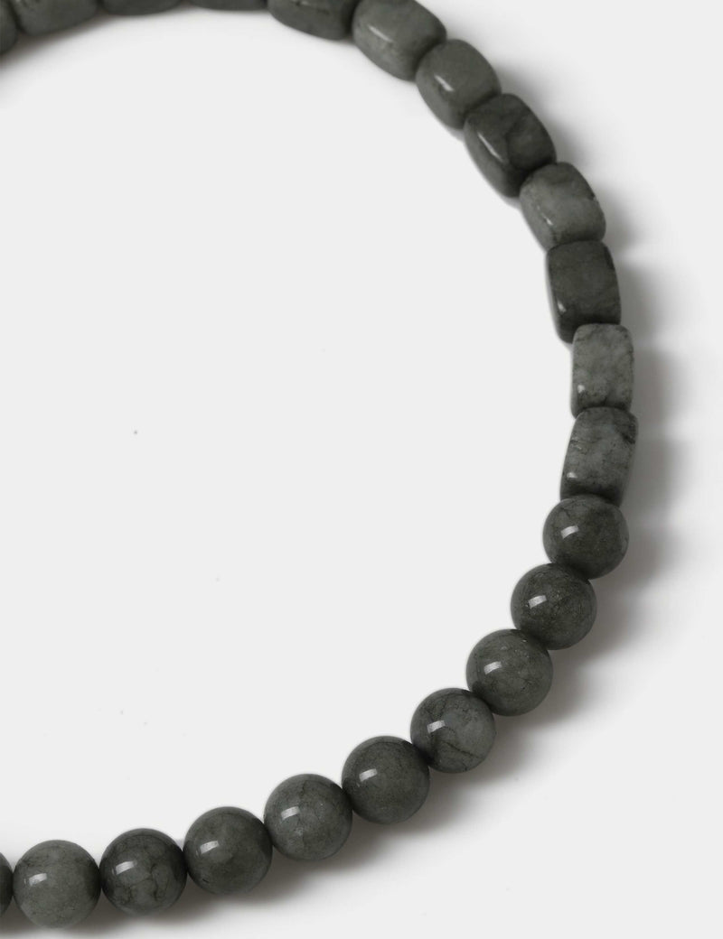 Natural stone tear drop necklace with 95% stone and metal clasp, imported from the UK