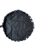 The Flat Lay Co. open flat makeup bag with double spots design, 52cm diameter, imported from the UK
